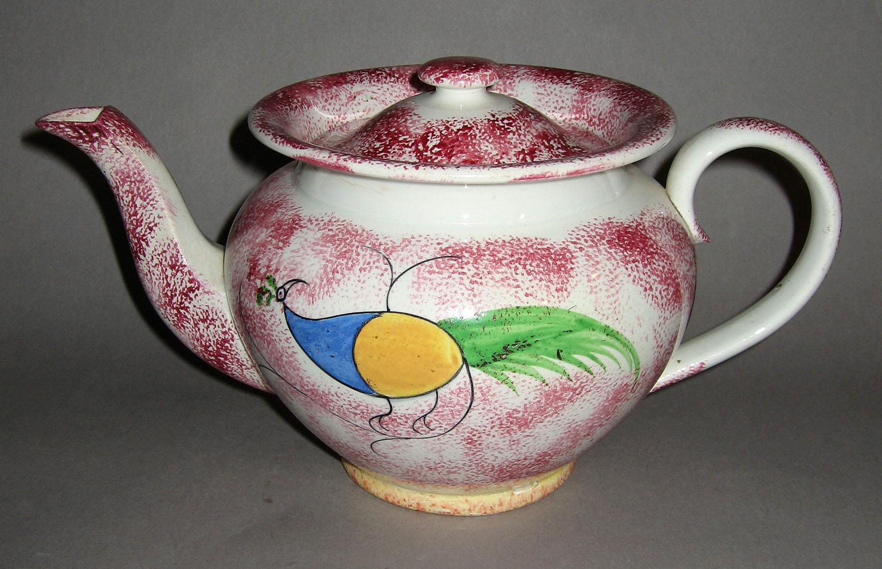 1965.0843 A, B Pink spatterware peafowl teapot