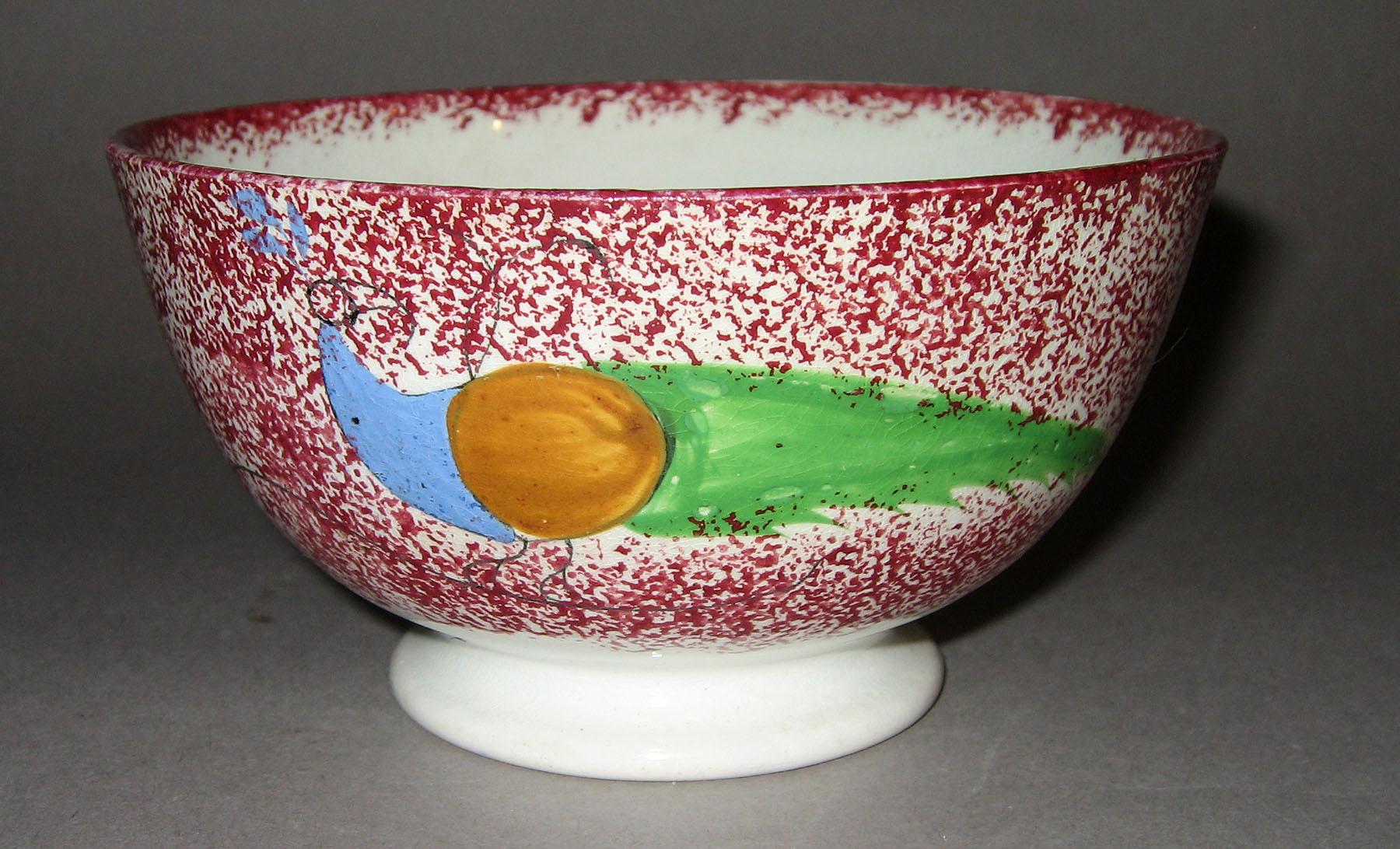 1965.0849 Pink spatterware peafowl bowl