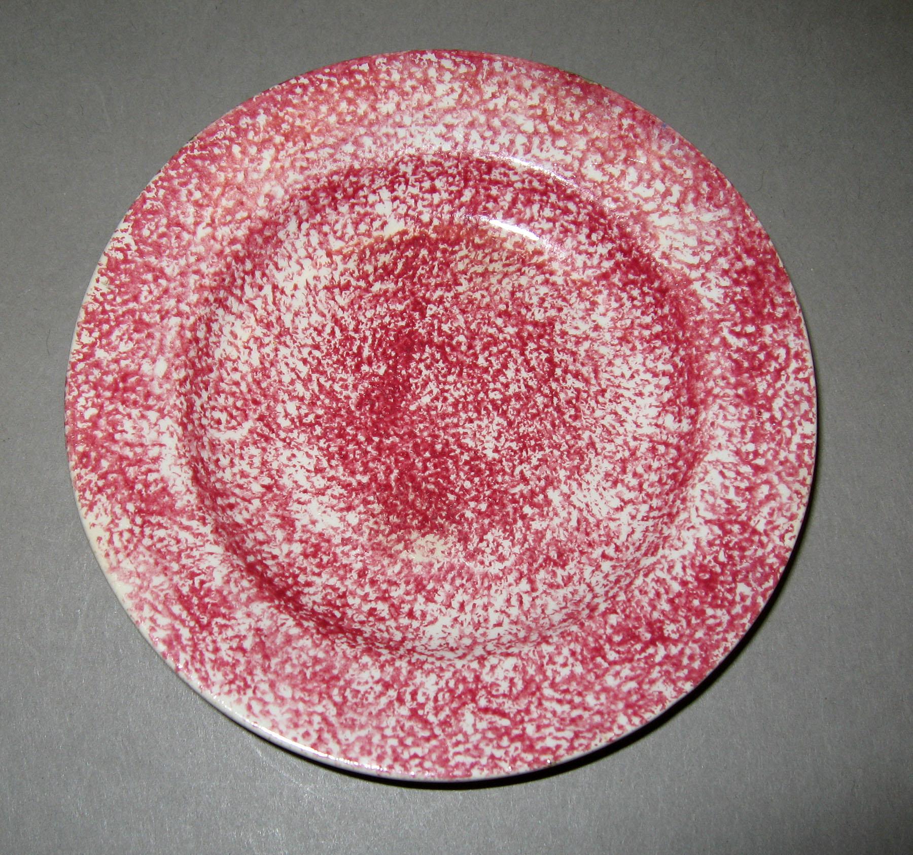1965.0852.001 Red spatter cup plate