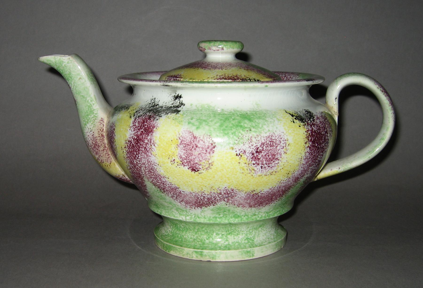 1965.0862.002 A, B Rainbow drape spatterware teapot