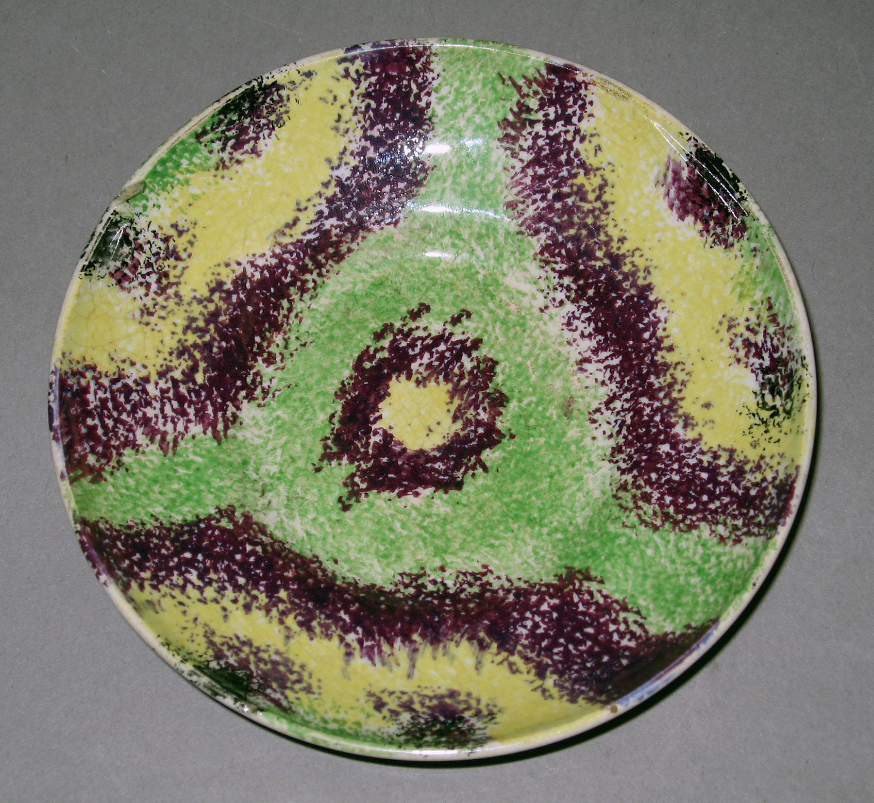 1965.0862.010 Spatterware saucer