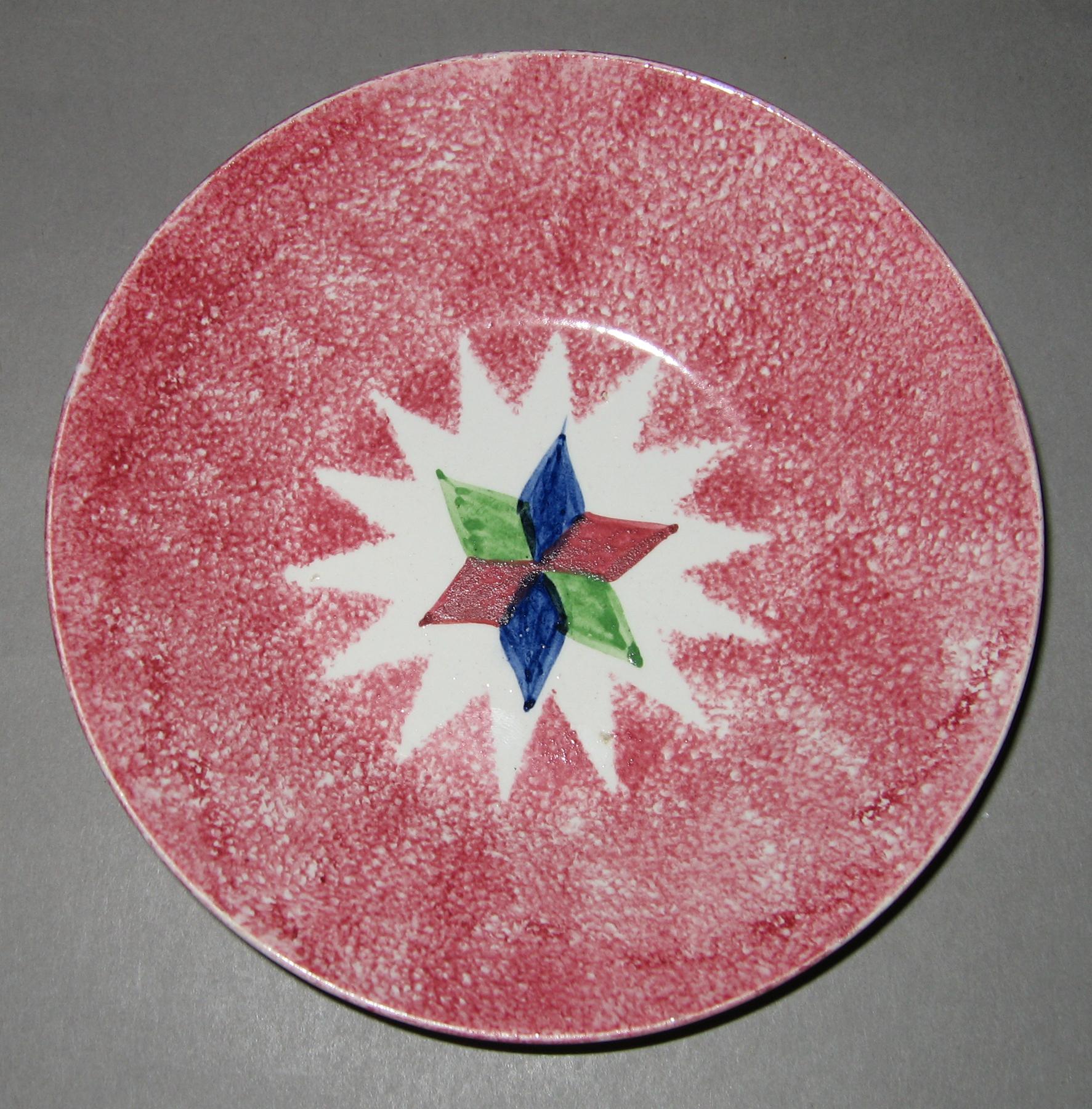1965.0902.001 Spatterware saucer