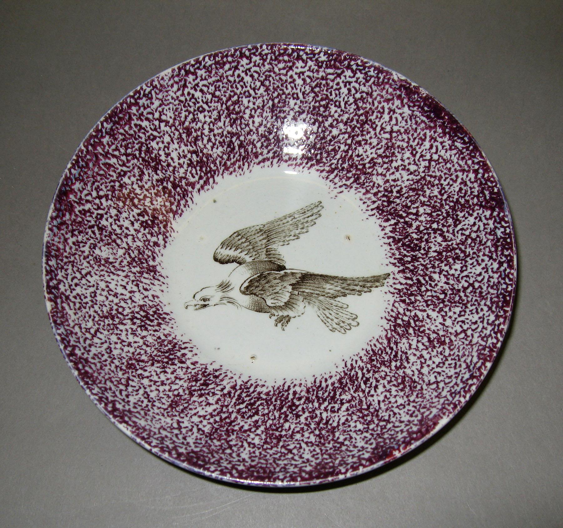 1965.0910.003 Eagle in Flight printed purple spatter saucer