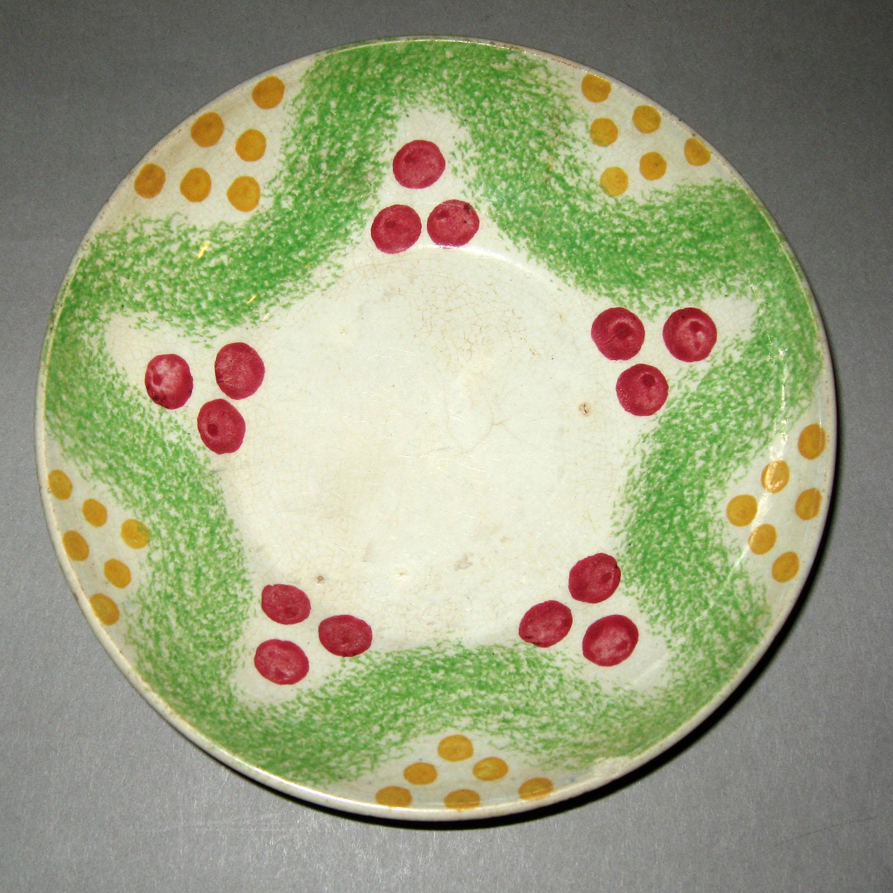 1965.0913.003 Christmas balls spatterware saucer