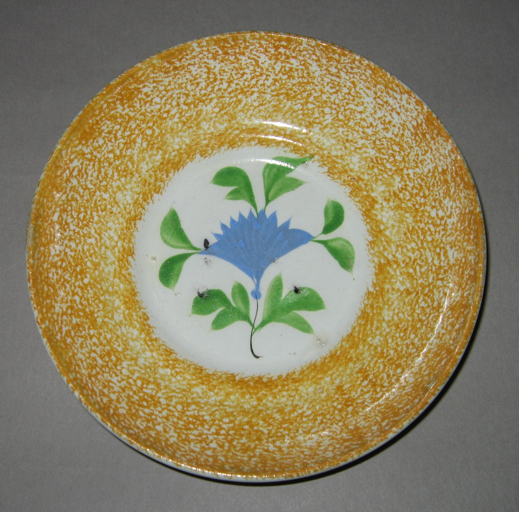 1965.0930 B Spatterware saucer
