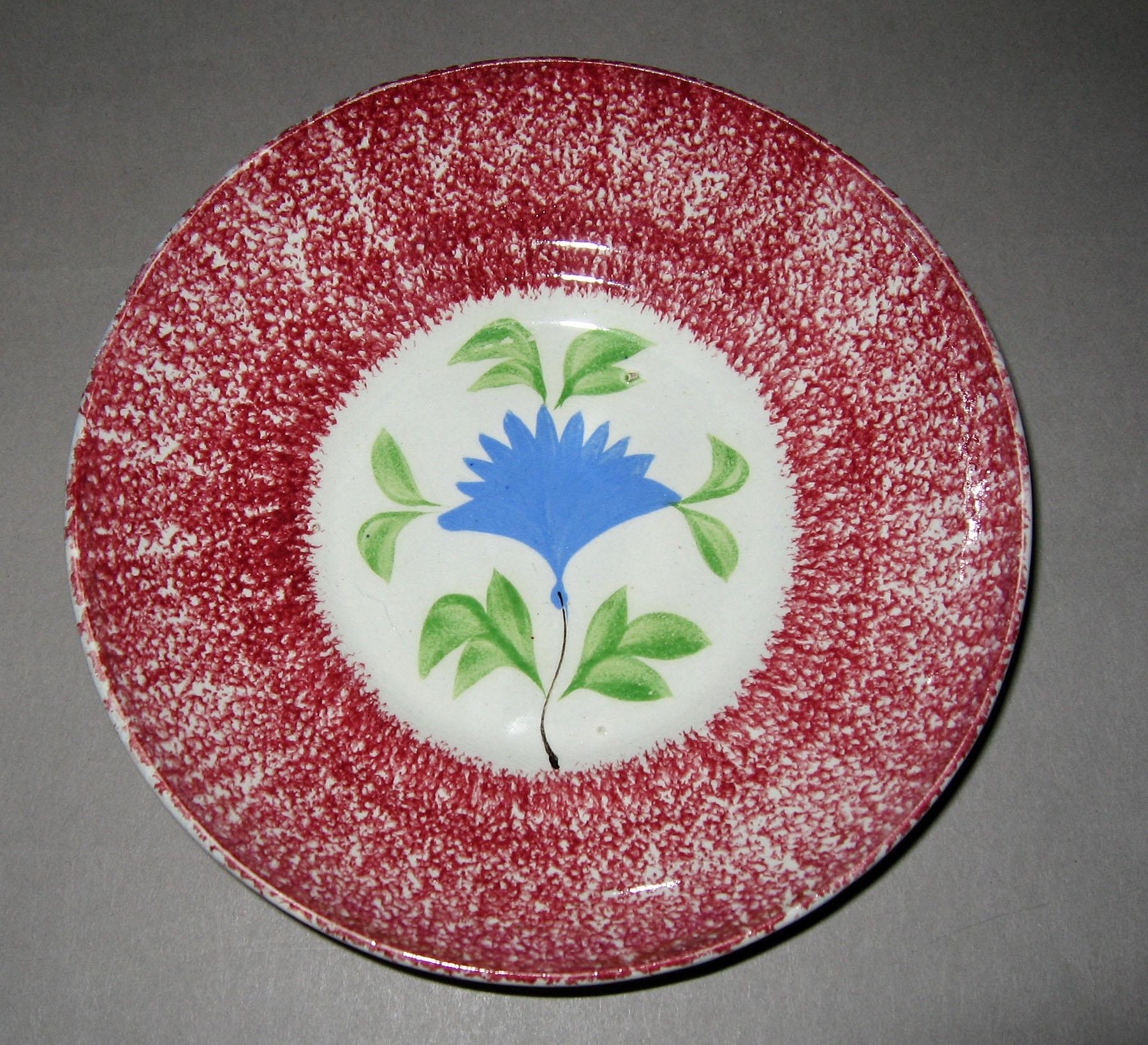 1965.0931 B pink spatterware with blue cockscomb saucer