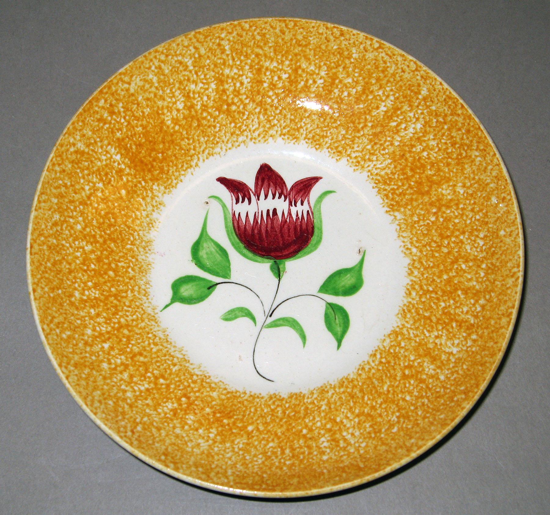 1965.0933.005 Spatterware saucer