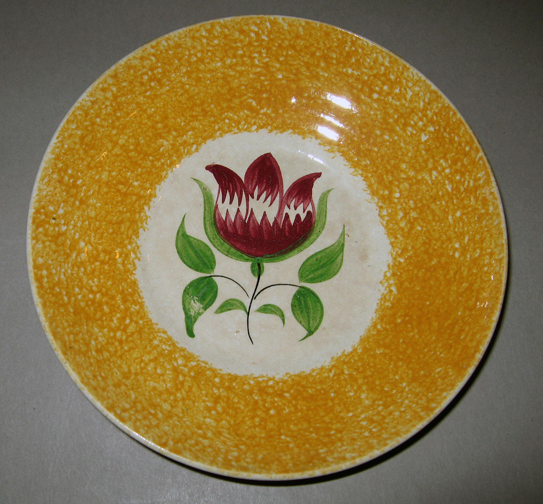 1965.0934 Spatterware saucer