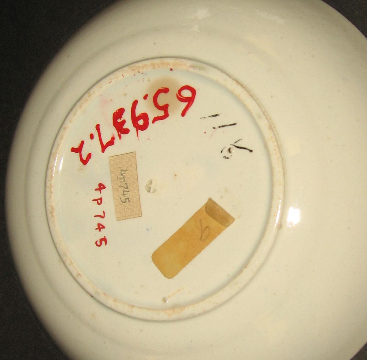1965.0937.002 Spatterware saucer (underside)