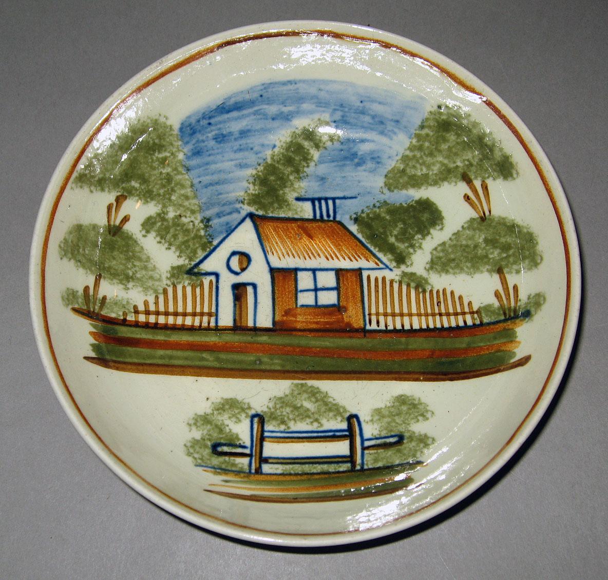1965.0945 B Creamware saucer