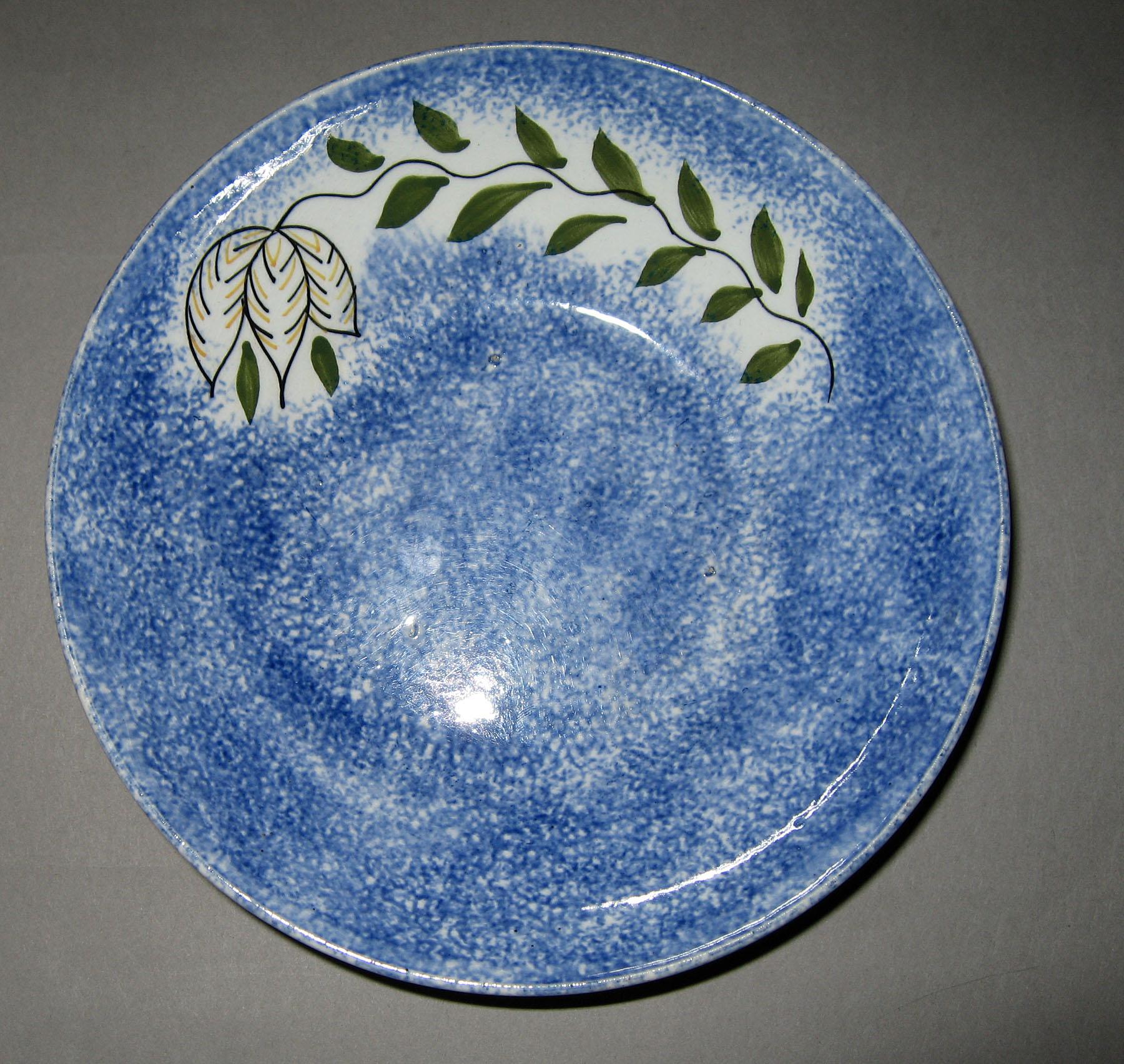 1965.0949 B  Blue spatterware tulip pattern saucer