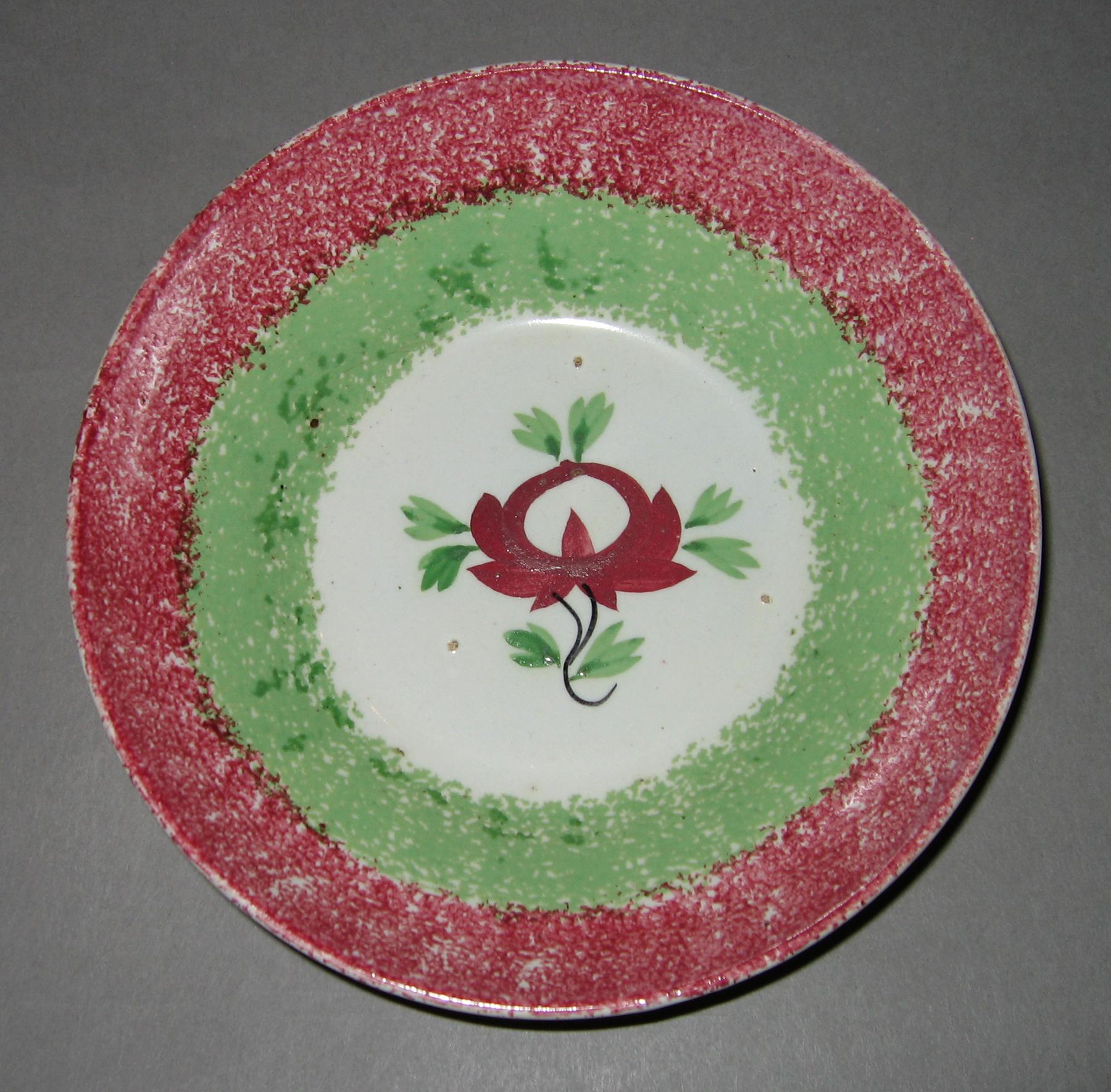 1965.0958.002 Spatterware saucer