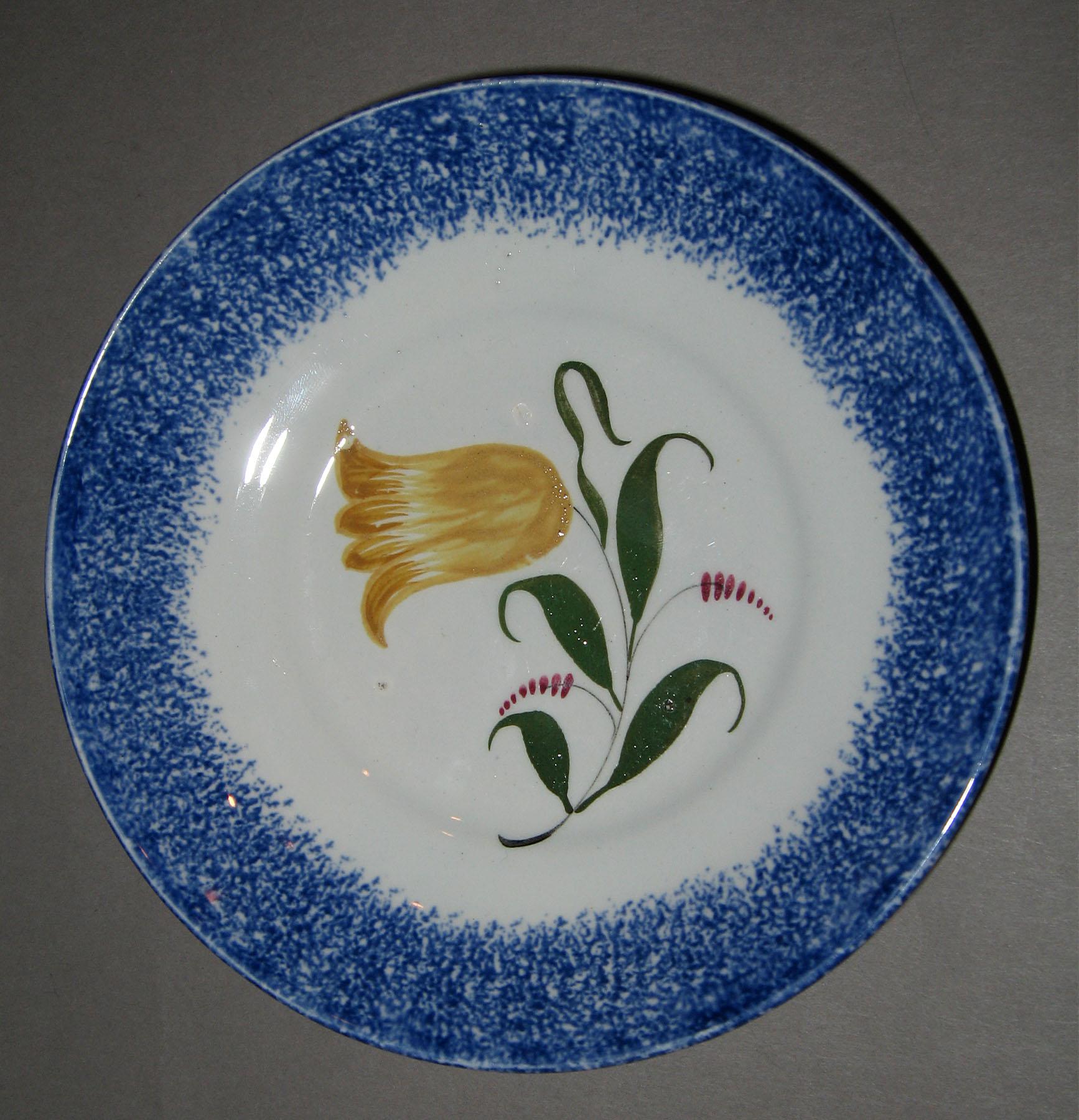 1965.0959 B Blue tulip spatterware saucer