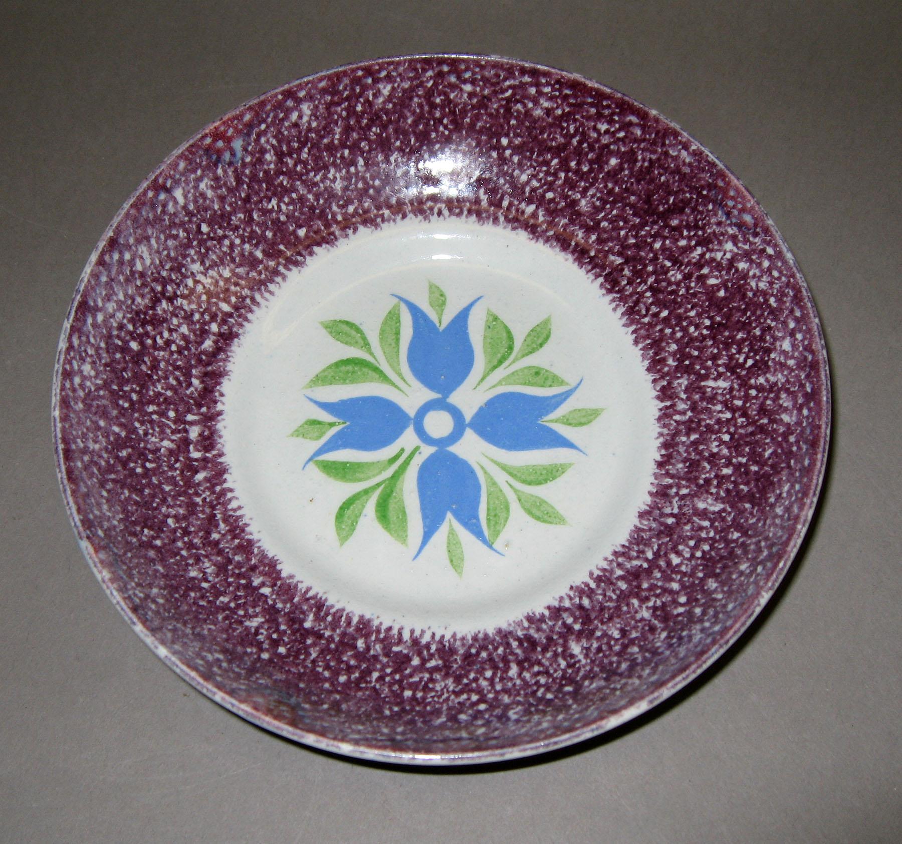 1965.0971.005 Cluster of buds purple spatter saucer
