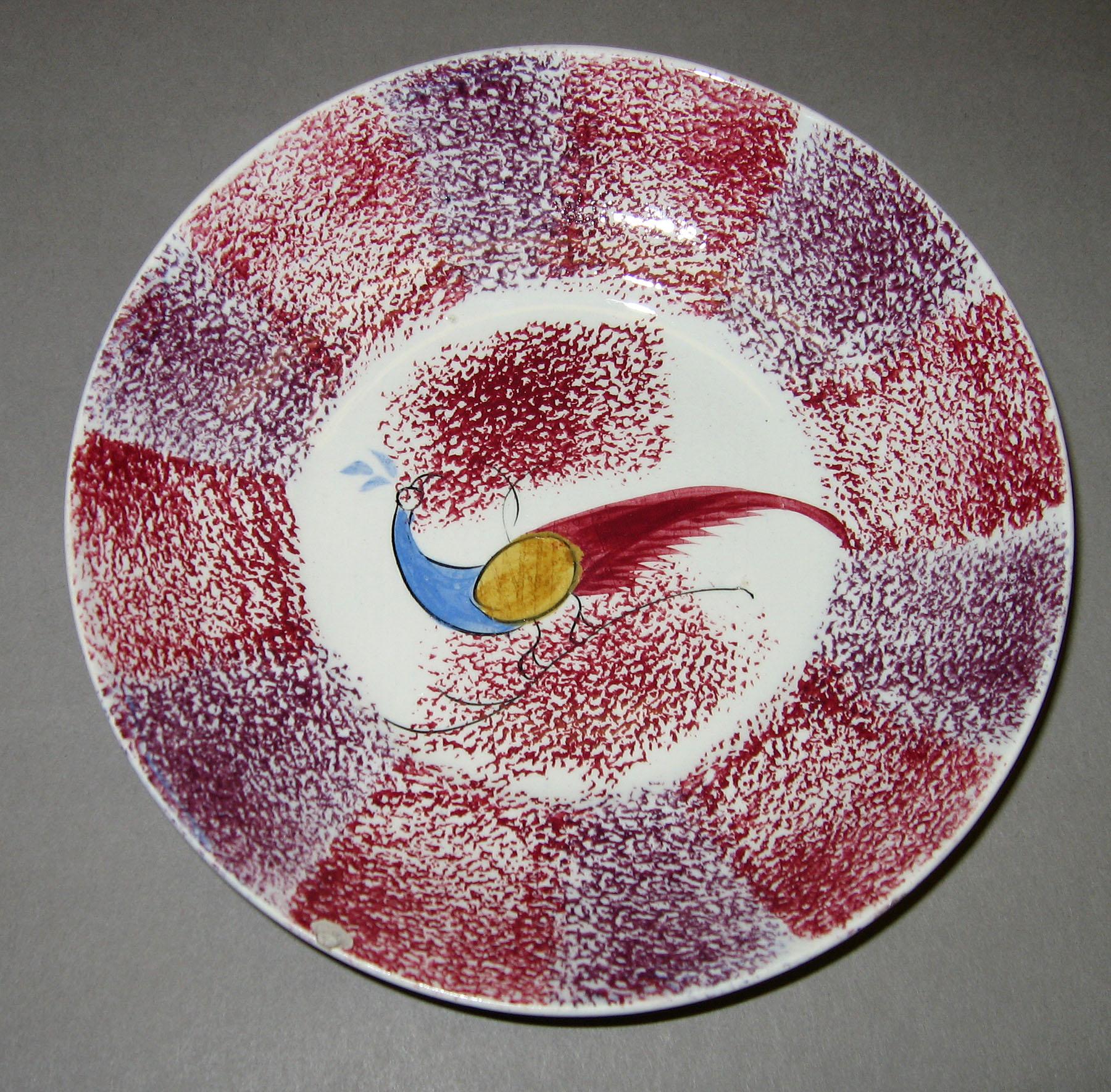 1965.0987.002 Rainbow peafowl pattern spatter saucer