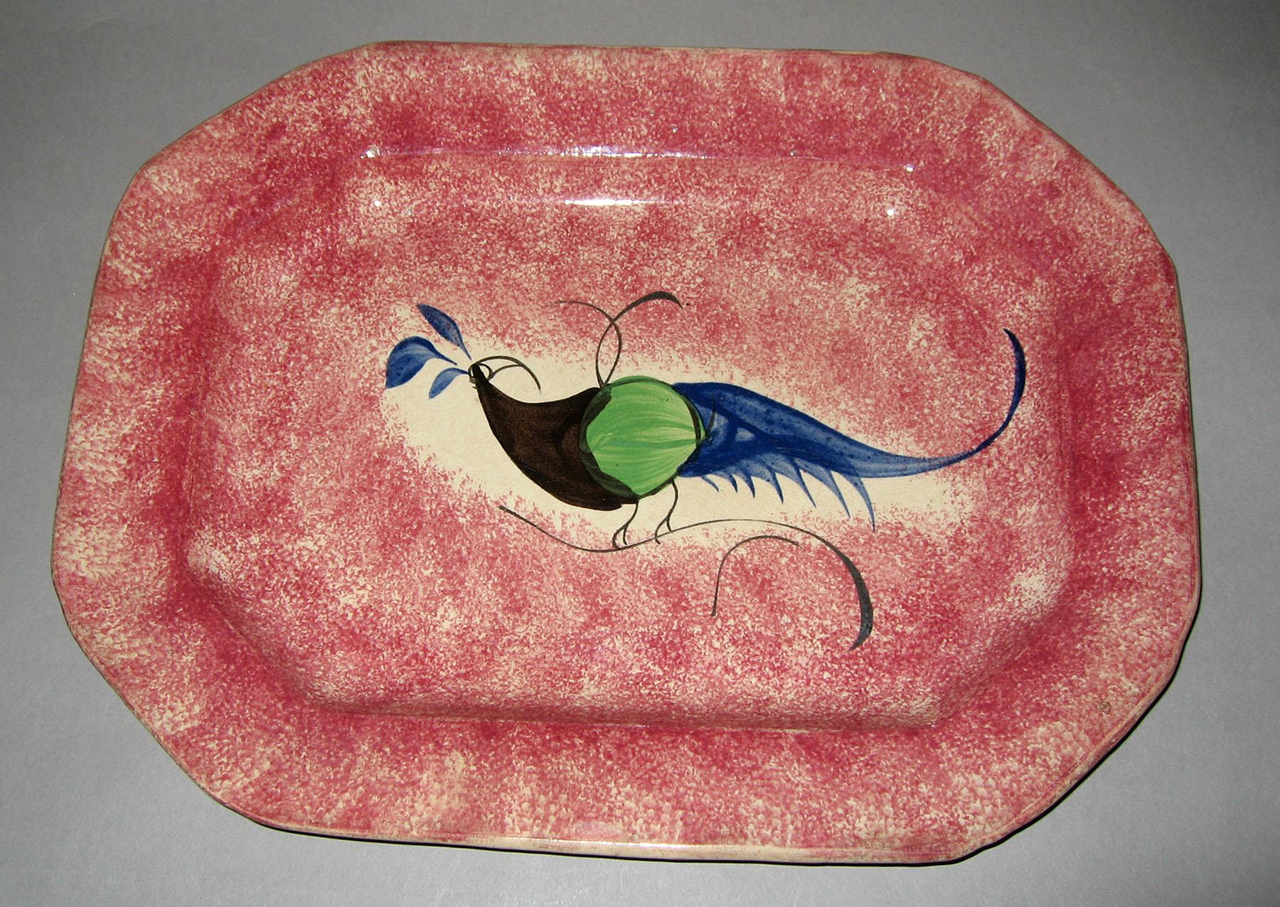 1965.0996 Pink spatterware peafowl dish