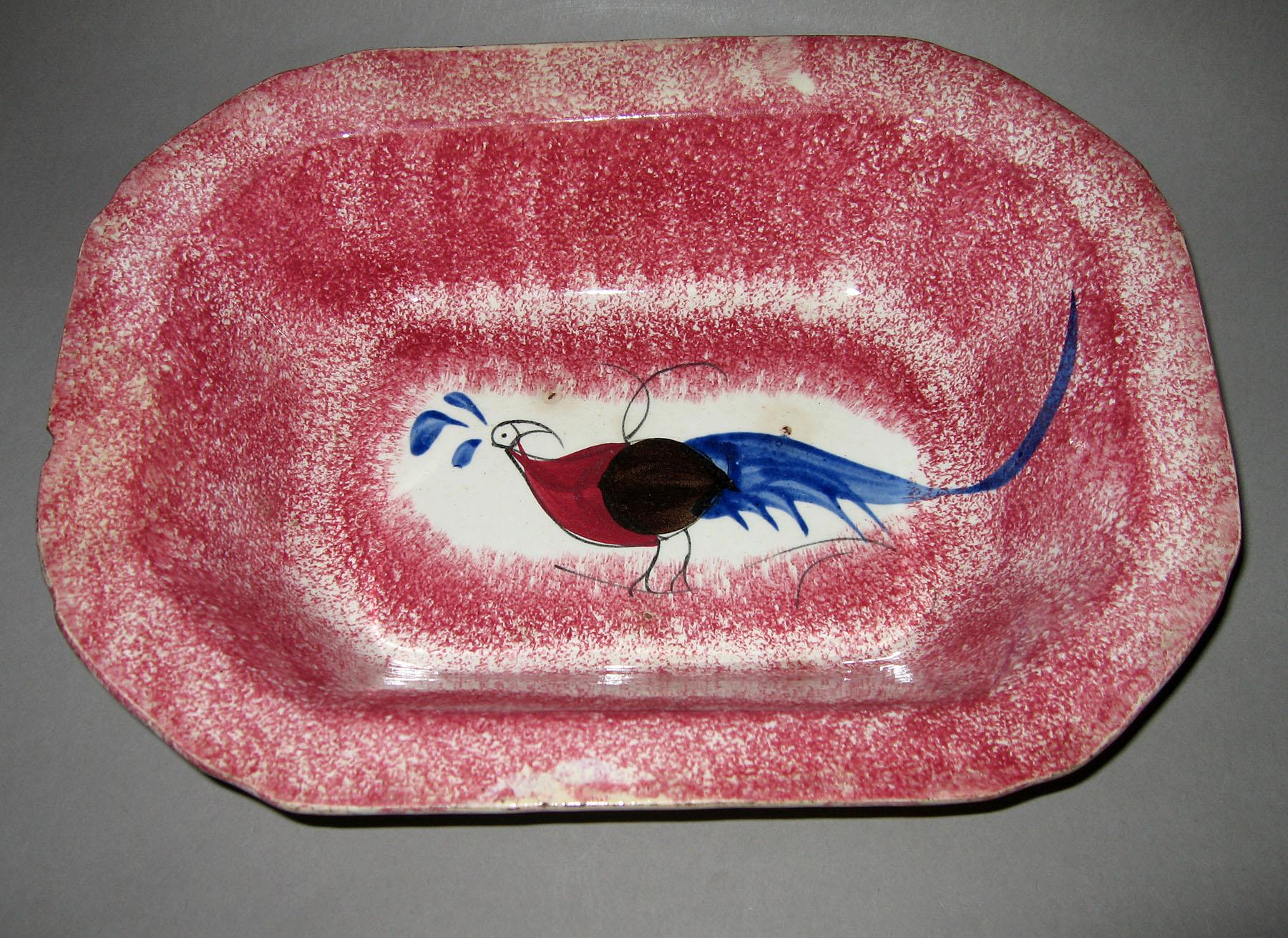 1965.1002 Pink spatterware peafowl dish