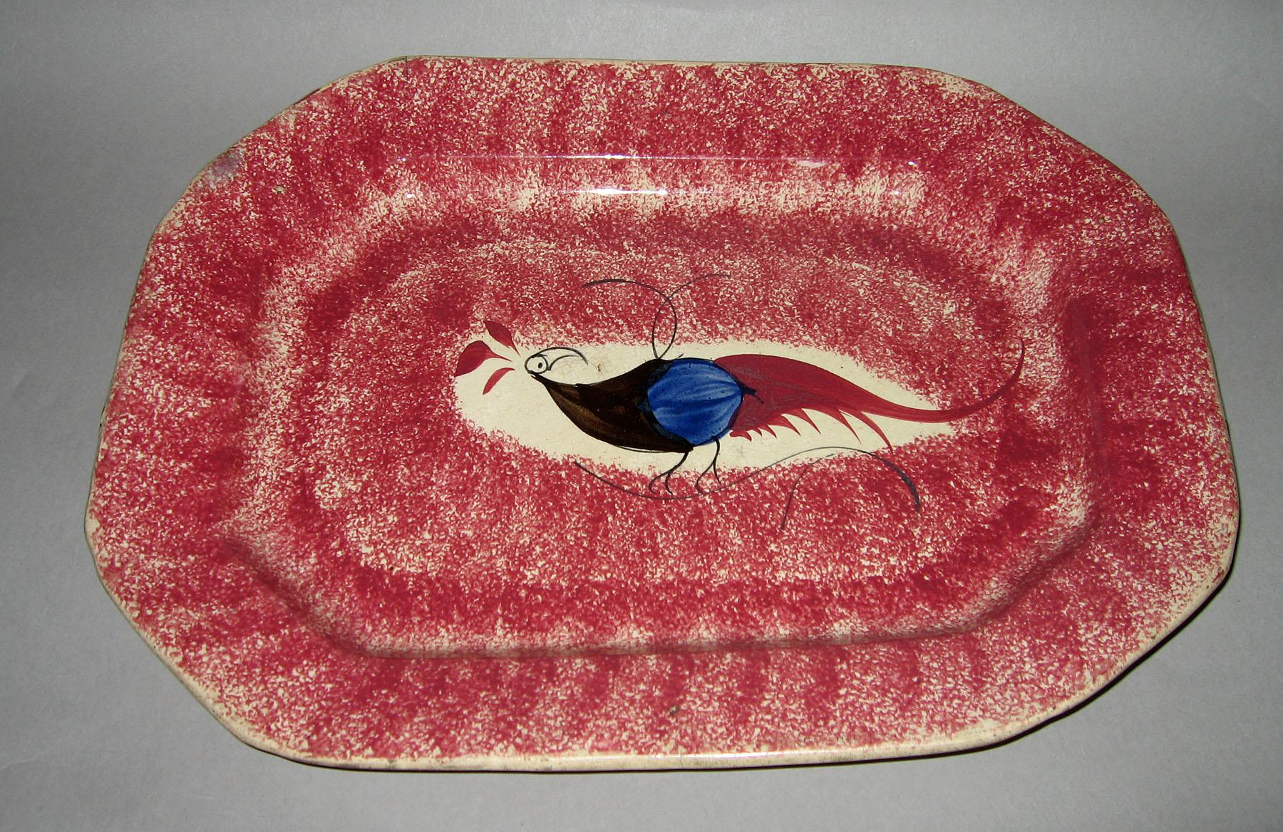 1965.1003 Pink spatterware peafowl dish
