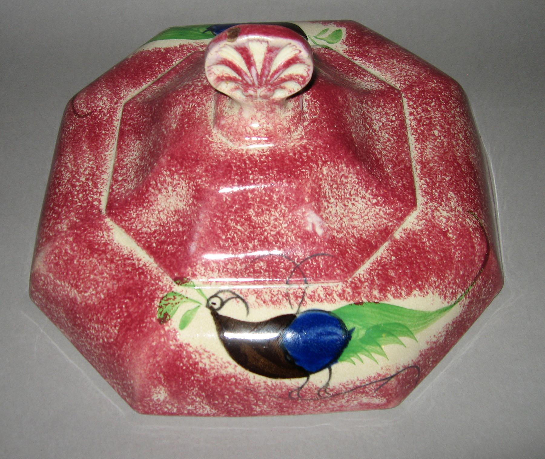 1965.1009 Pink spattterware peafowl dish cover