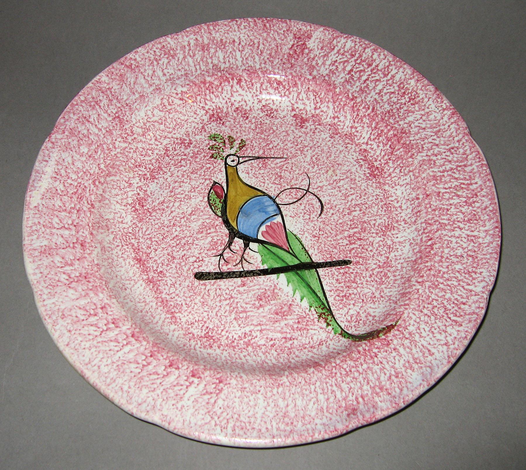 1965.1010.003 Pink spatterware bird on a bar plate