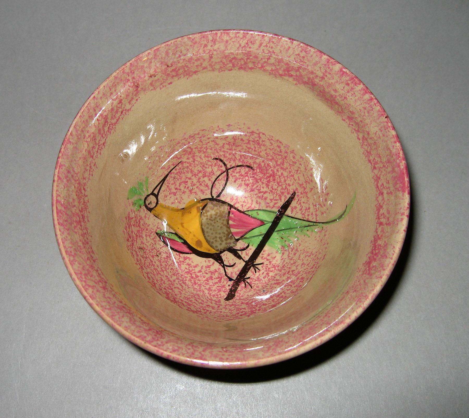 1965.1011.002 Pink spatterware peafowl teabowl