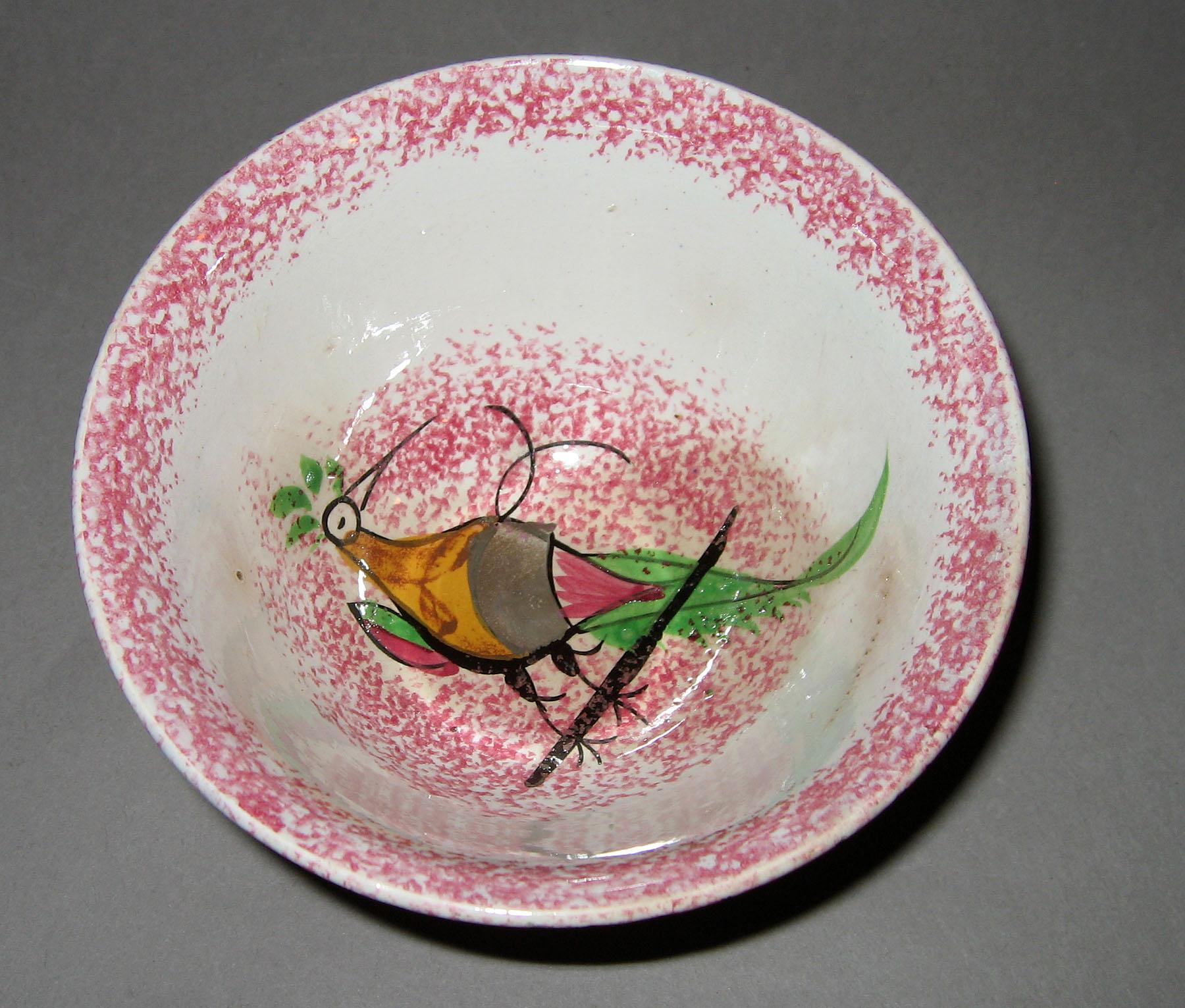 1965.1011.003 Pink spatterware peafowl teabowl