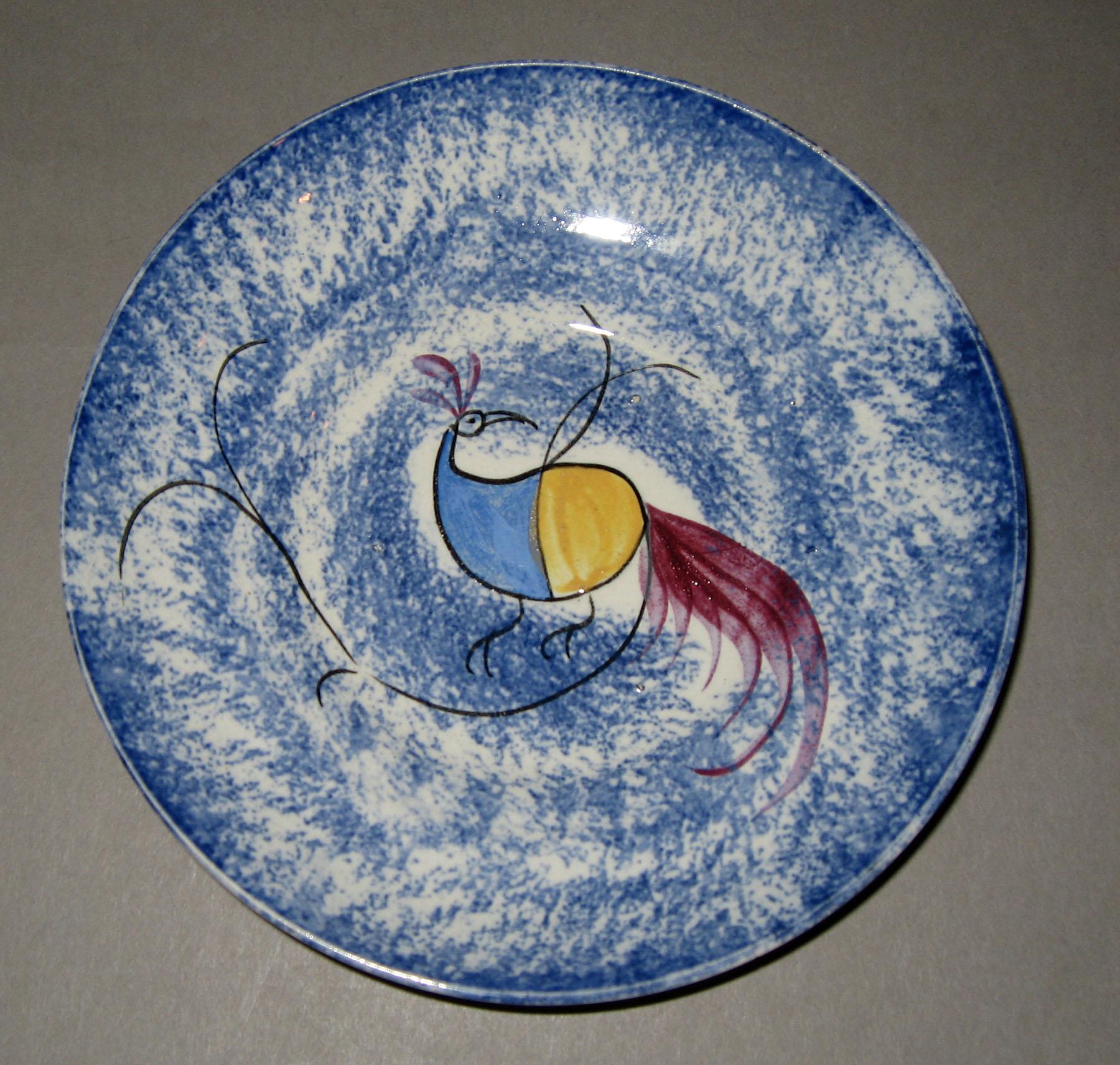 1965.1027.002 Blue spatterware peafowl saucer