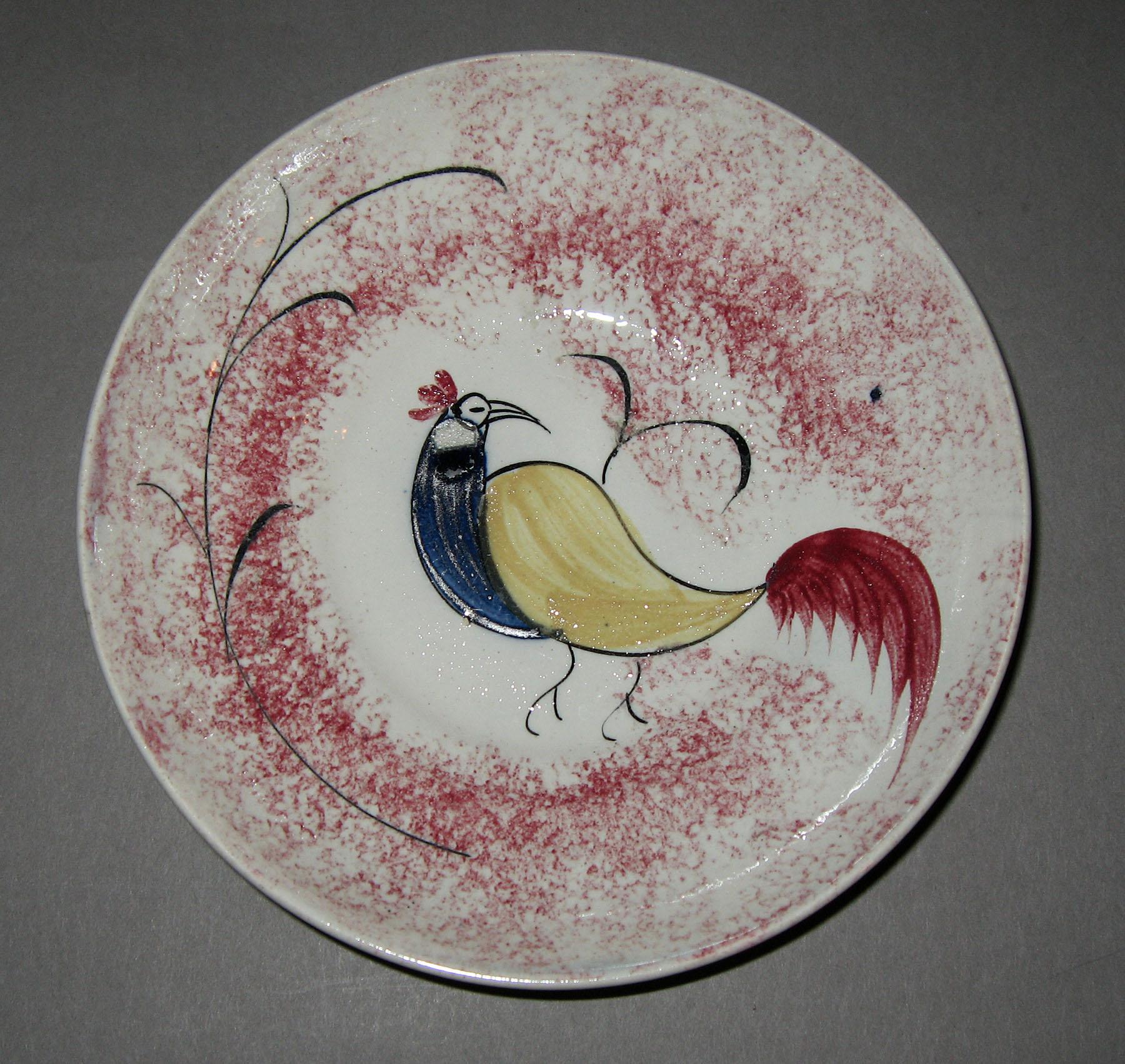 1965.1032 B Pink spatterware peafowl saucer