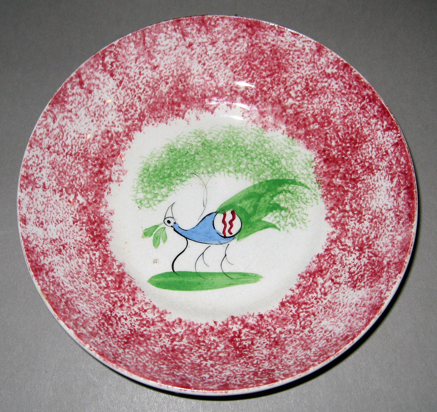 1965.1034 Spatterware saucer