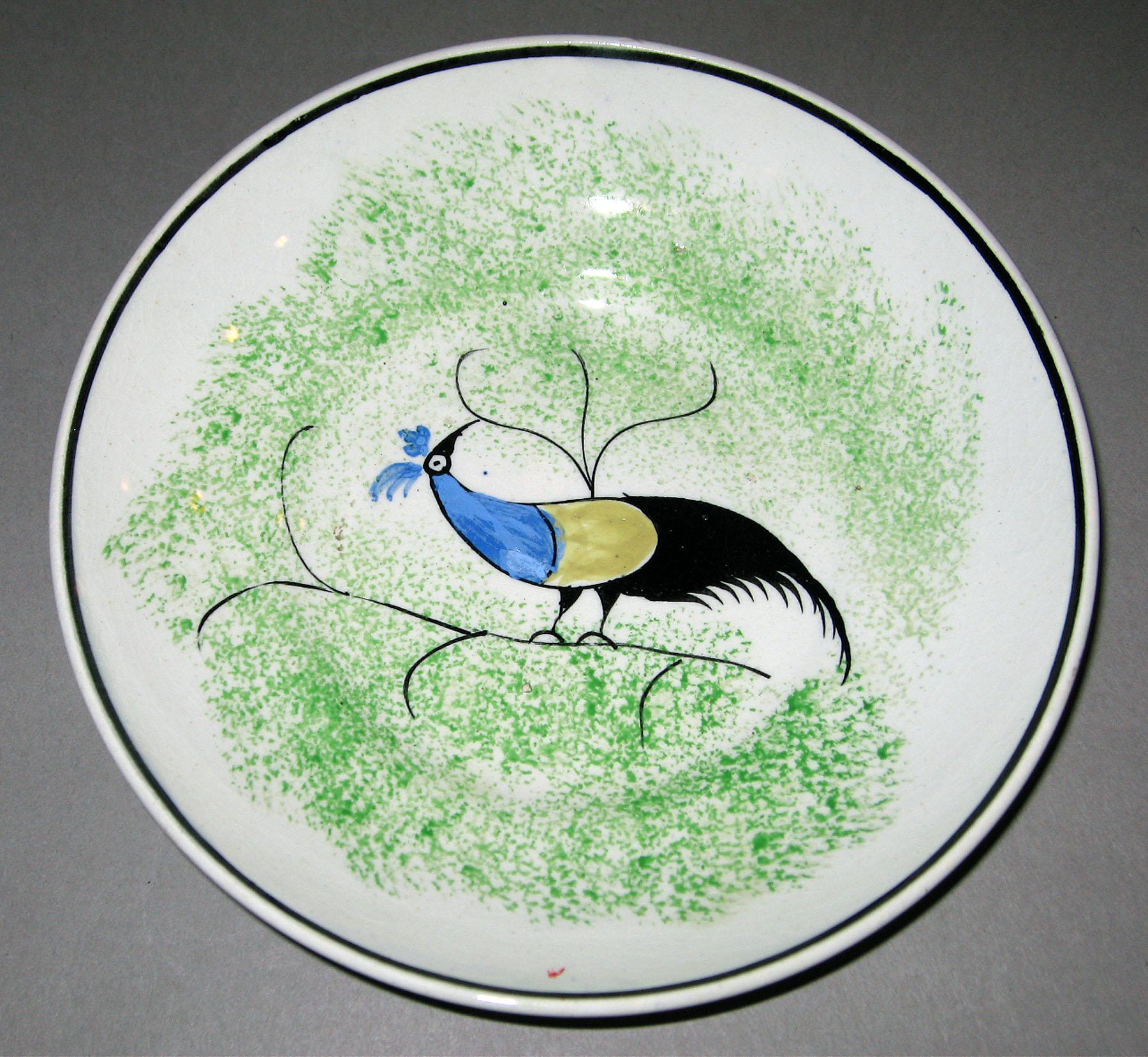 1965.1036.001 Spatterware saucer