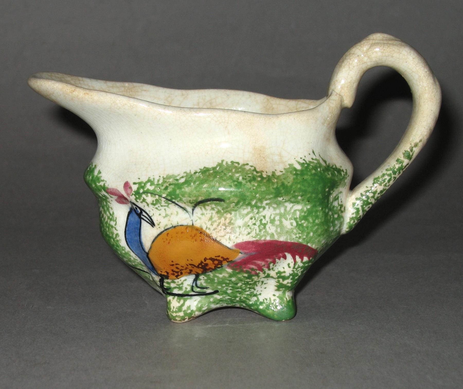 1965.1049 Spatterware cream pot