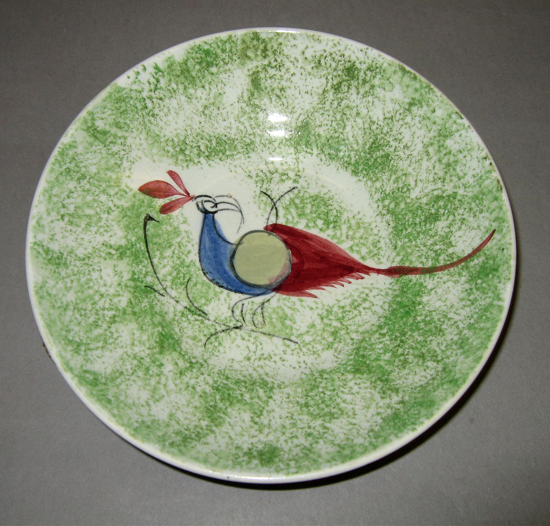1965.1053.001 Green spatter peafowl saucer