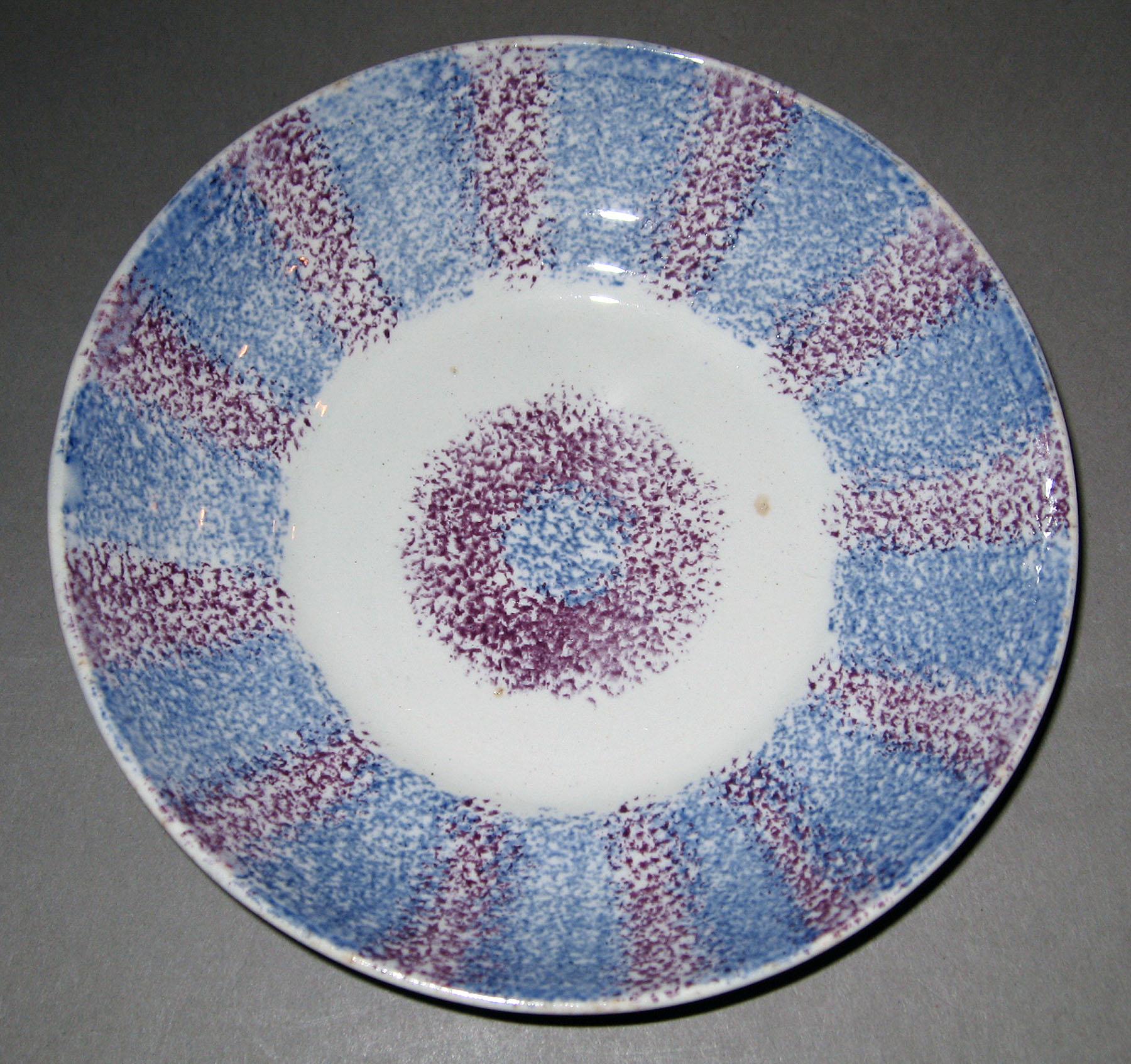 1965.1090 Spatterware saucer