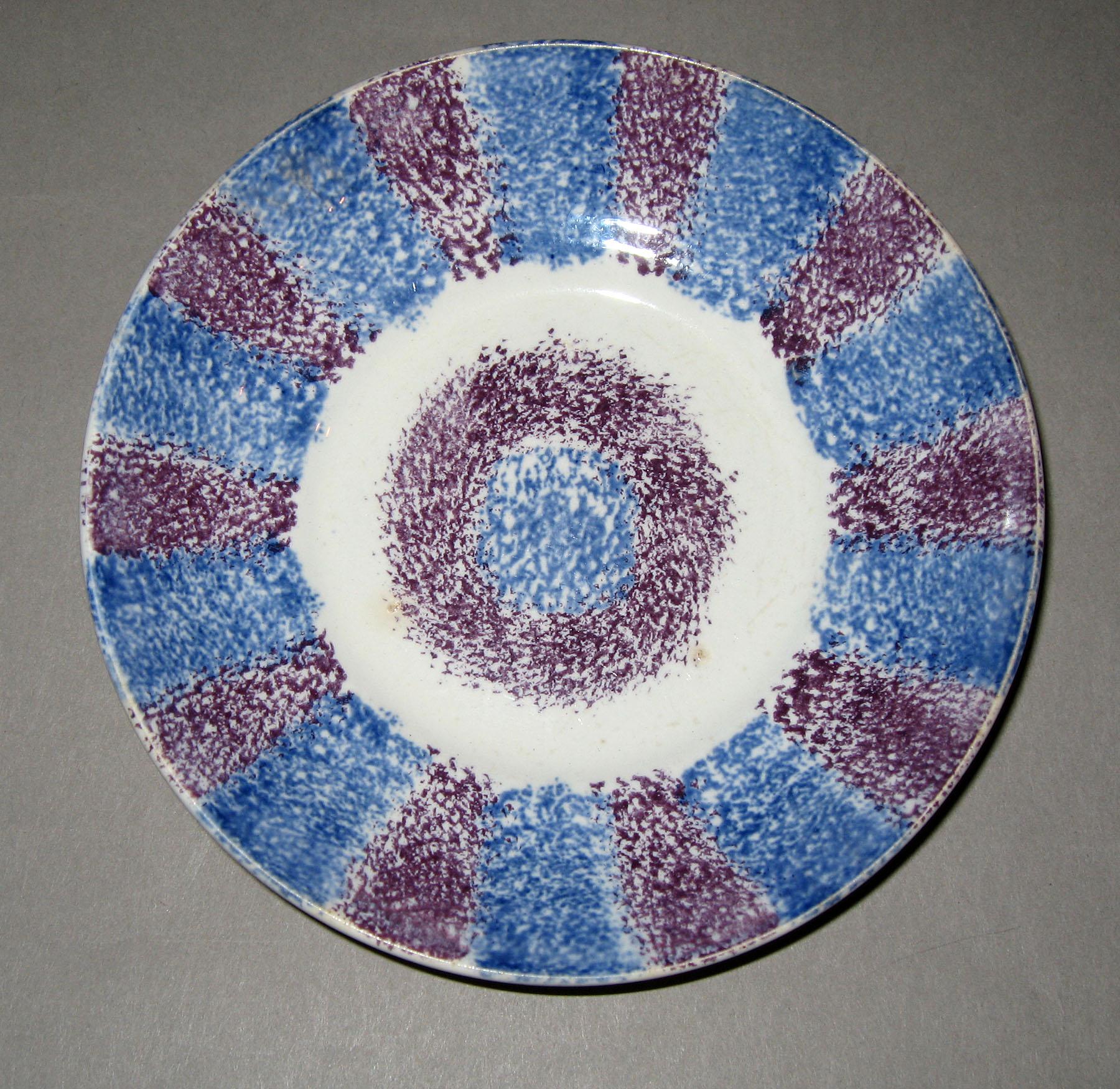 1965.1091 Blue and purple spatterware saucer
