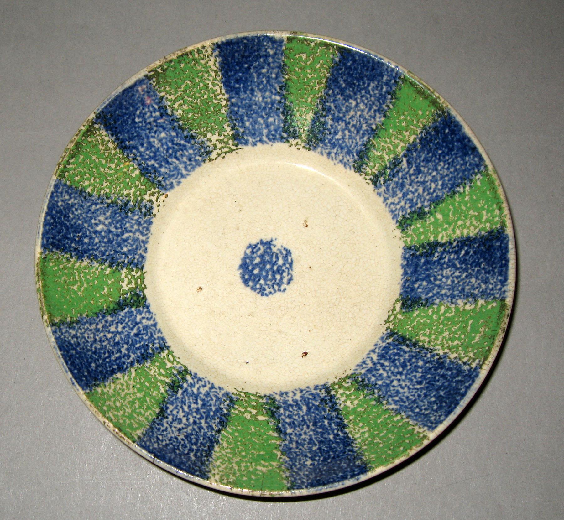 1965.1097 Blue and green spatterware saucer