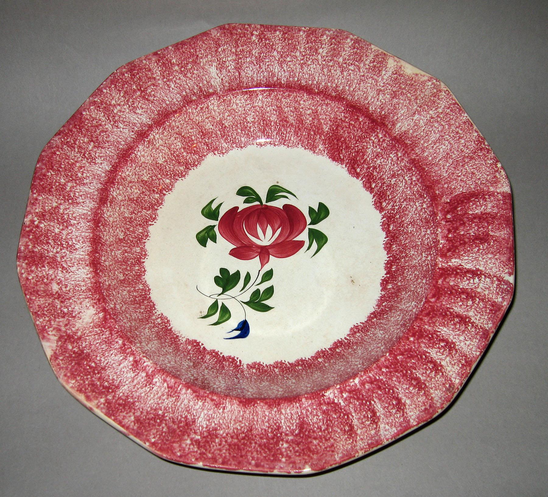 1965.1137 Pink spatterware rose pattern soup plate