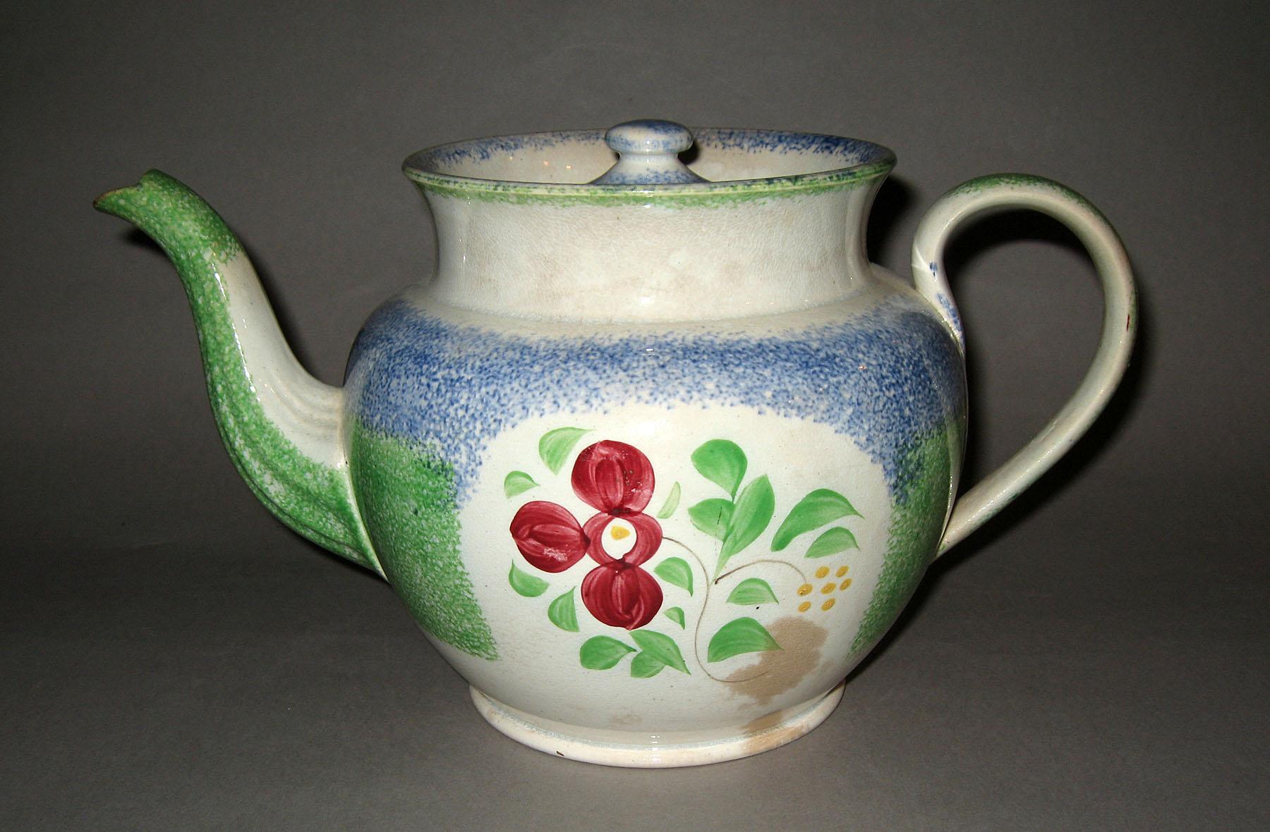 1965.1141 A, B Blue and green spatterware teapot with primrose pattern