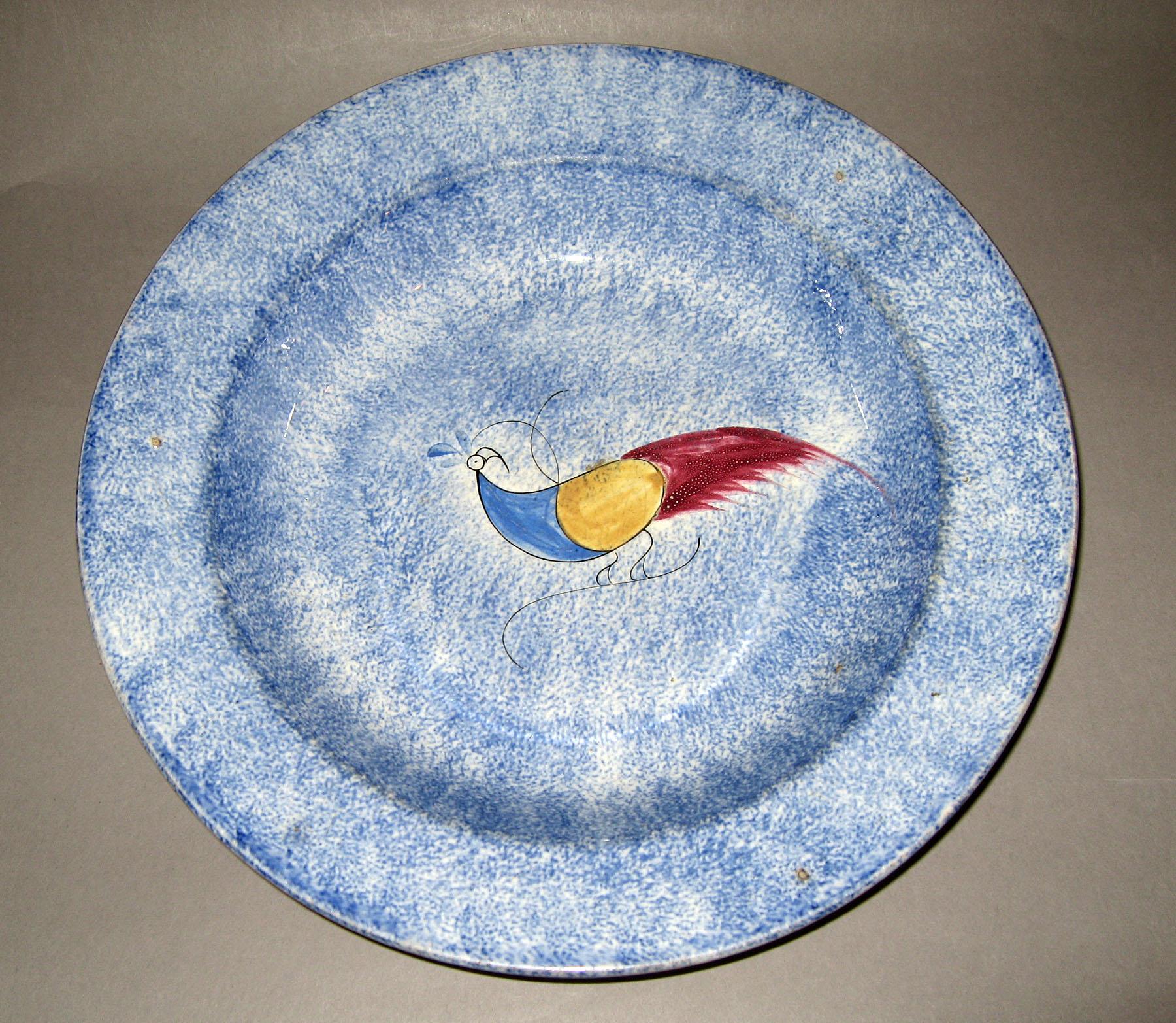 1956.1156 Peafowl blue spatterware soup plate