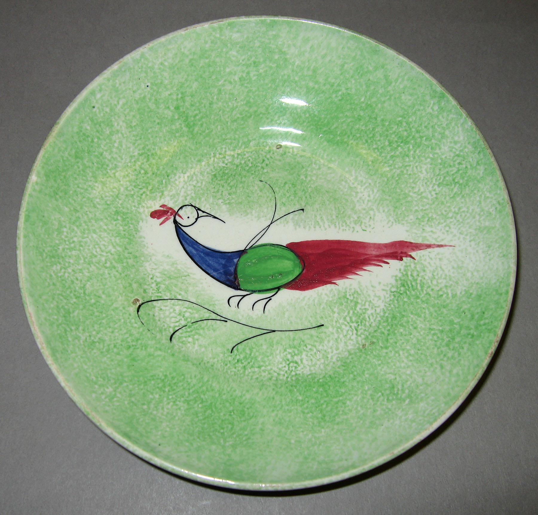 1965.1176.001 Green spatter peafowl saucer
