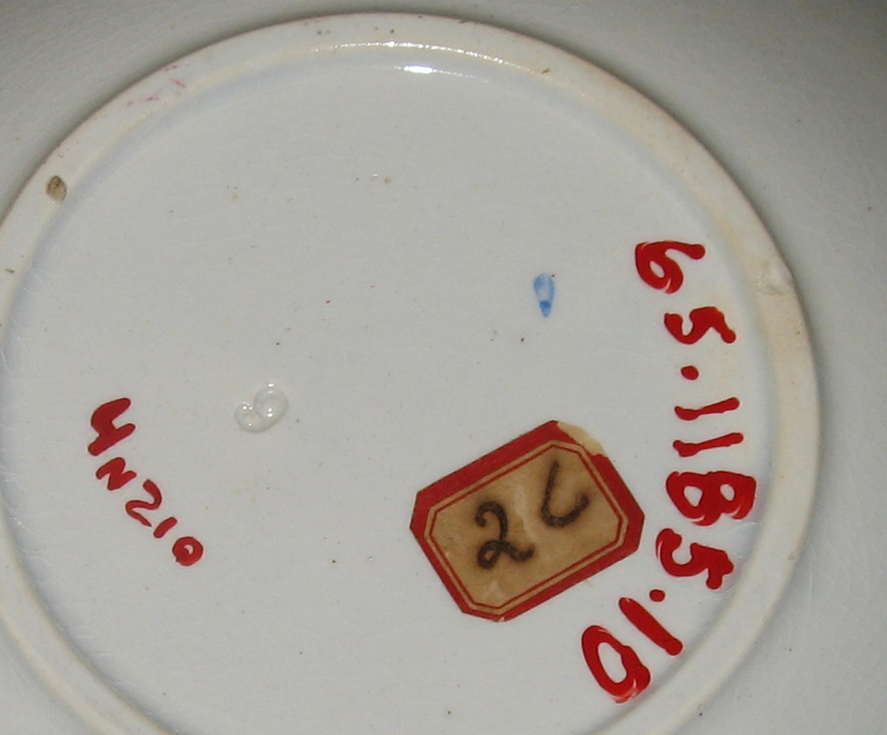 1965.1185.010 Spatterware saucer (mark)