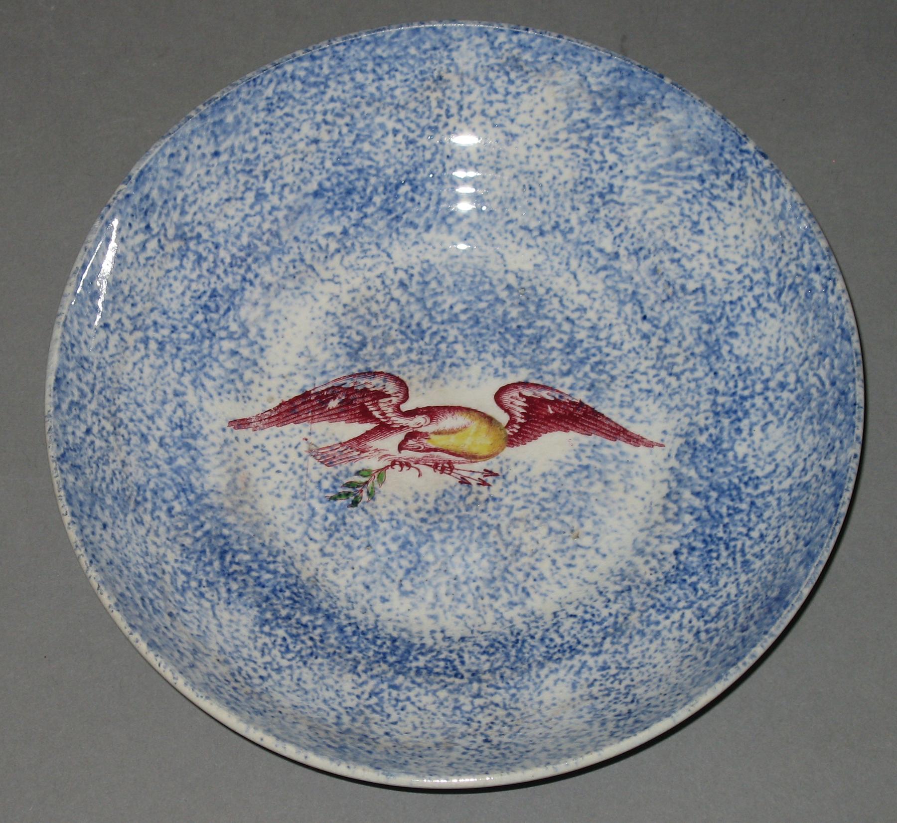 1965.1190.001 Spatterware saucer