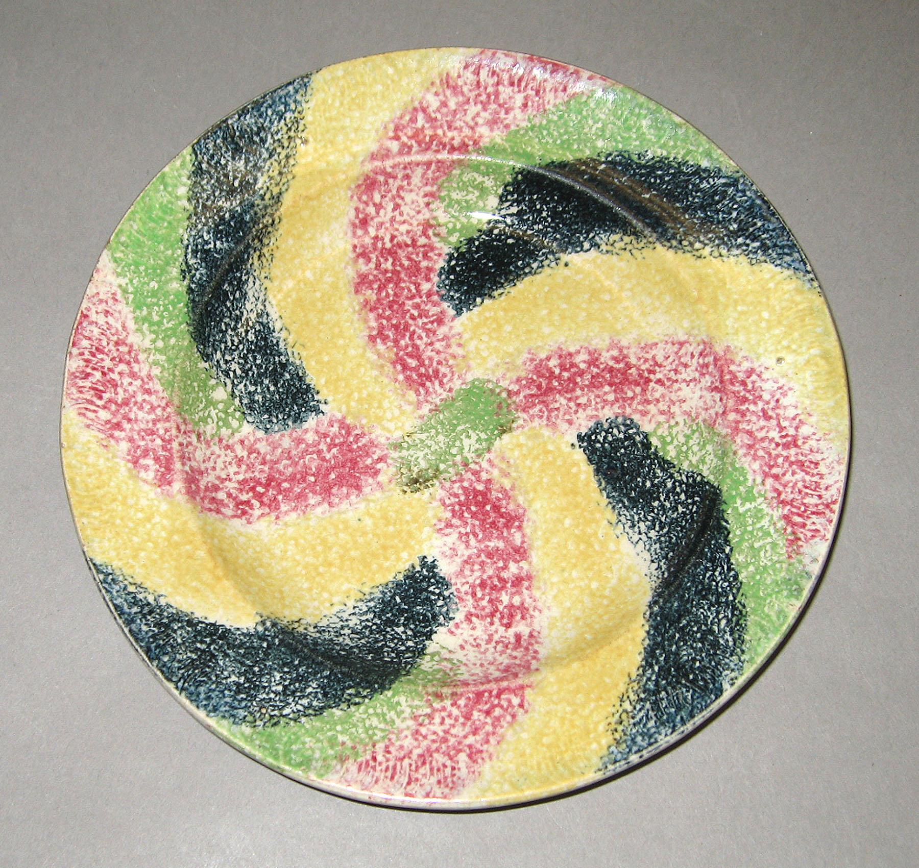 1965.1209 Spatterware saucer