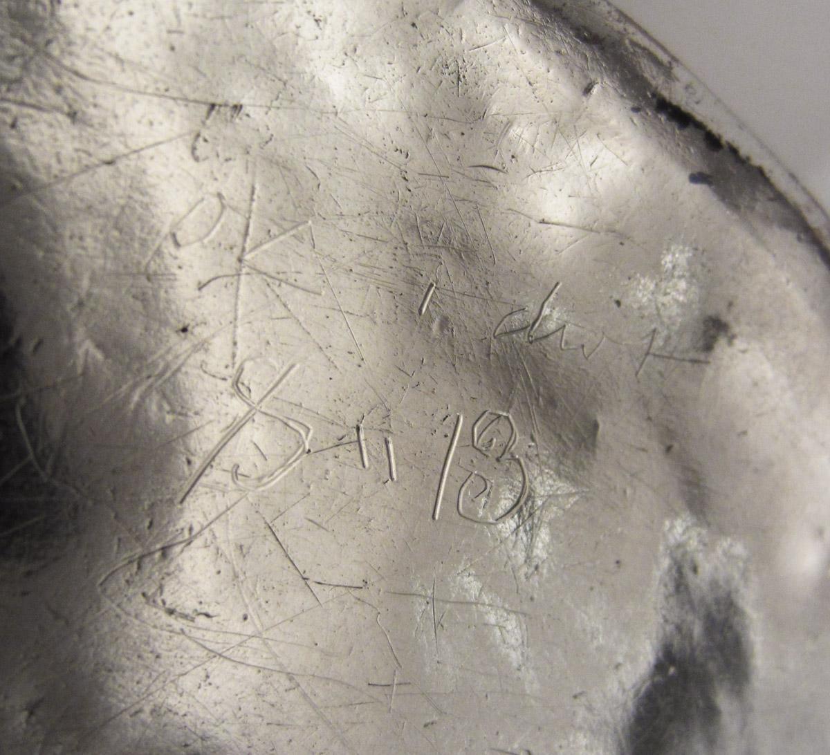 1965.1350 Cup, inscription