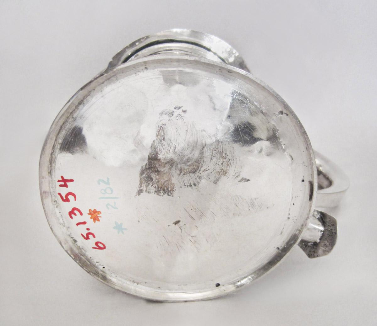 1965.1354 Tankard, underside