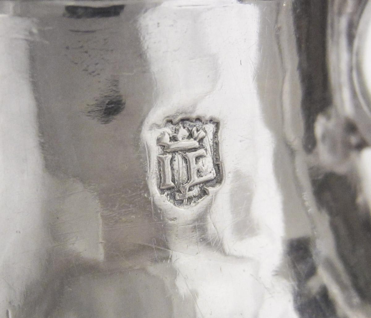 1965.1358 A Spout cup, mark