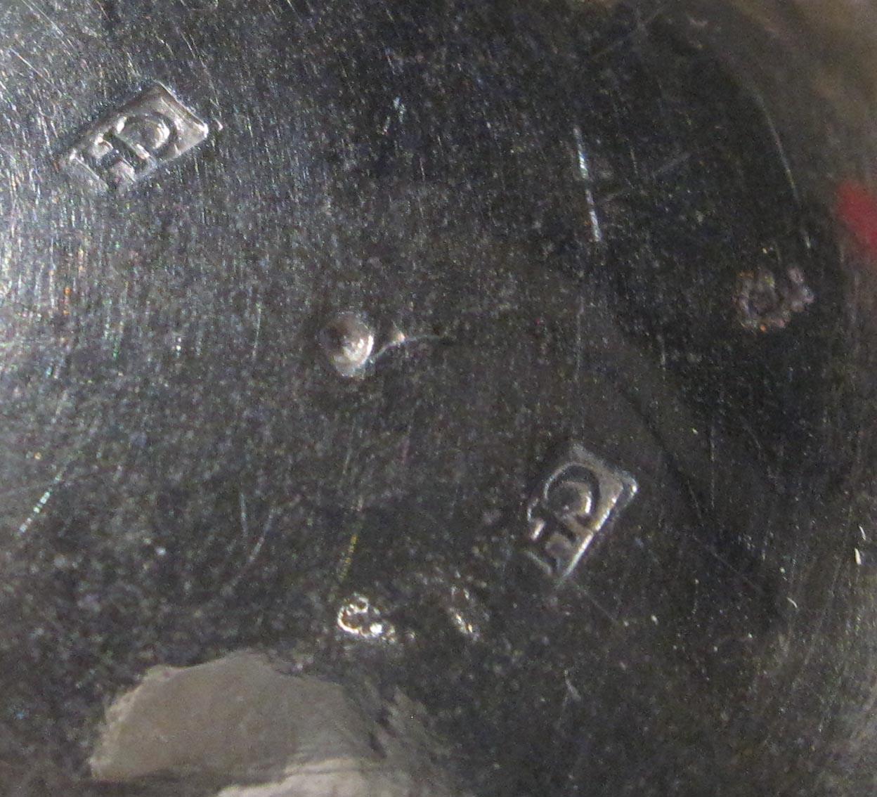 1965.1379 can underside marks