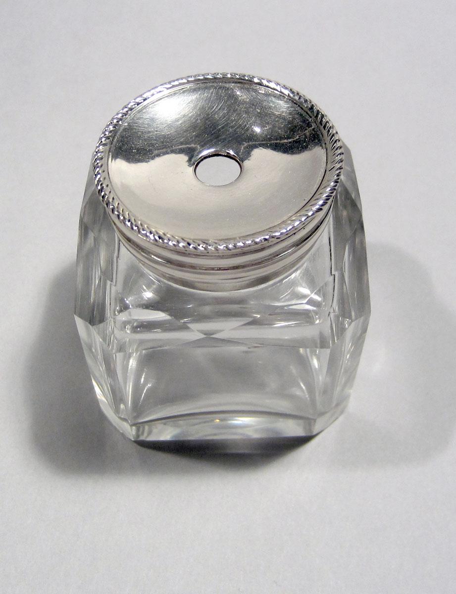 1965.1406 E, H Silver and Glass Inkstand bottle and cap top view