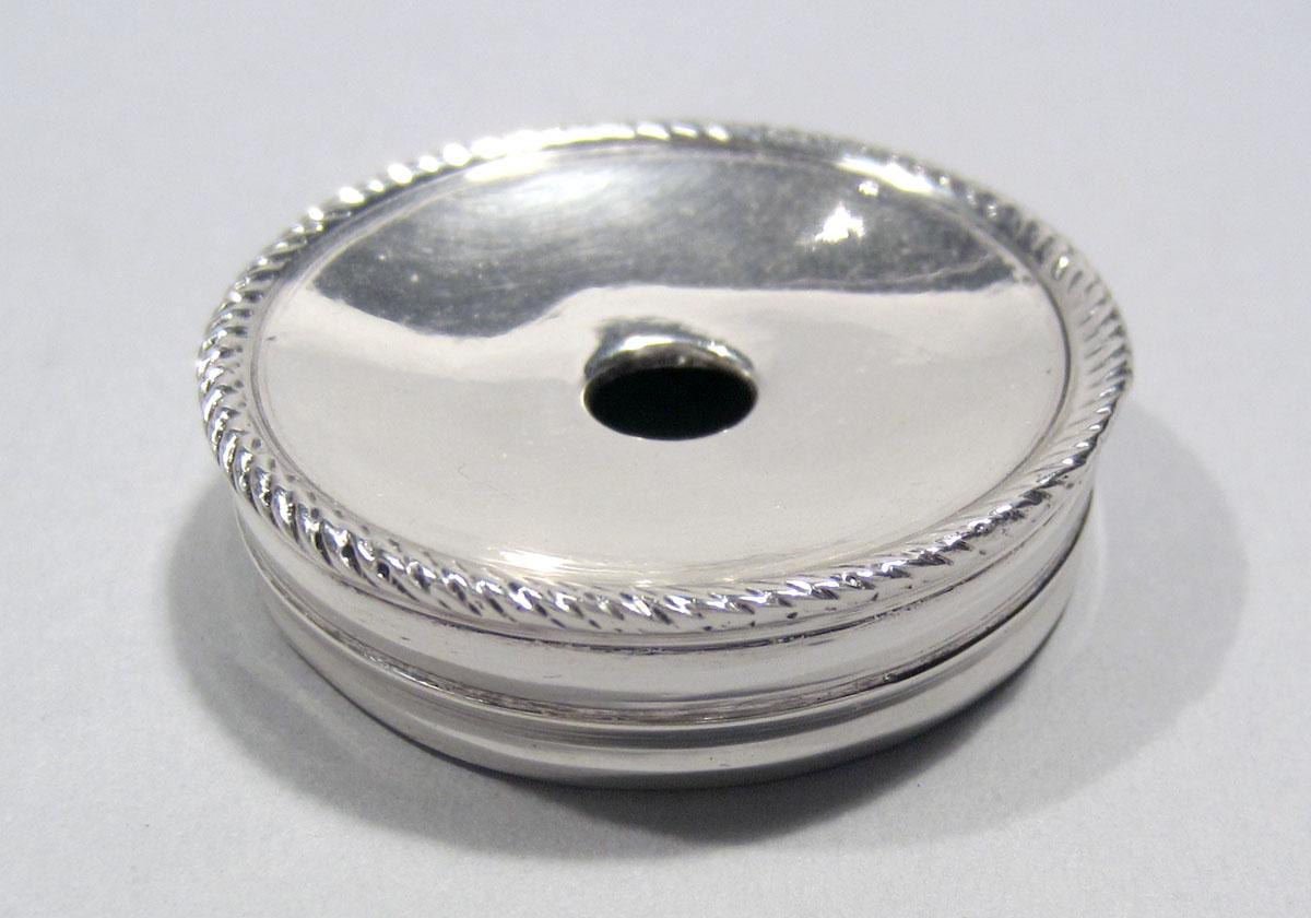 1965.1406 H Silver Inkstand cap upper surface