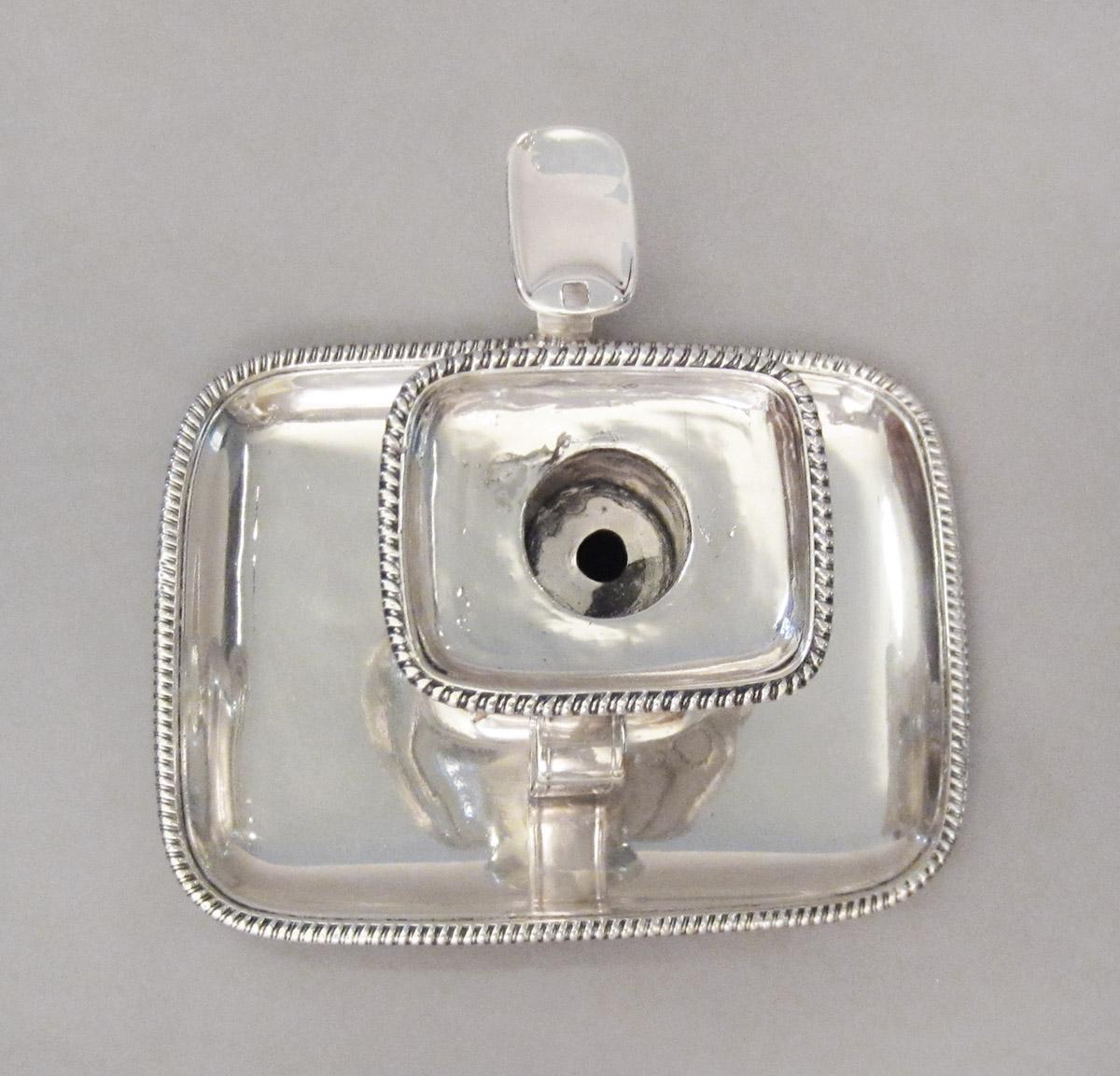 1965.1412 A, B Candlestick, upper surface