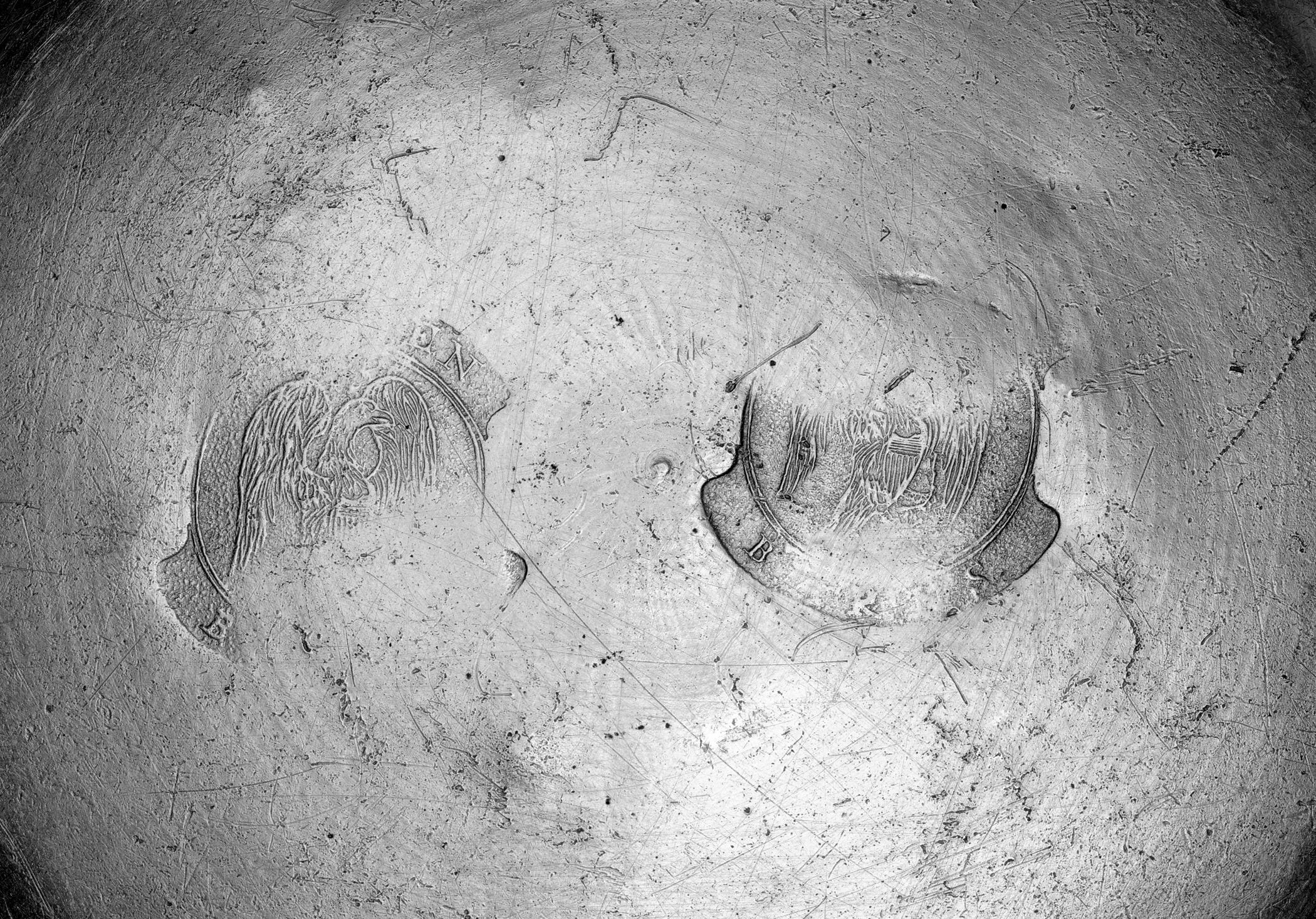 1965.1458 Pewter plate (marks)